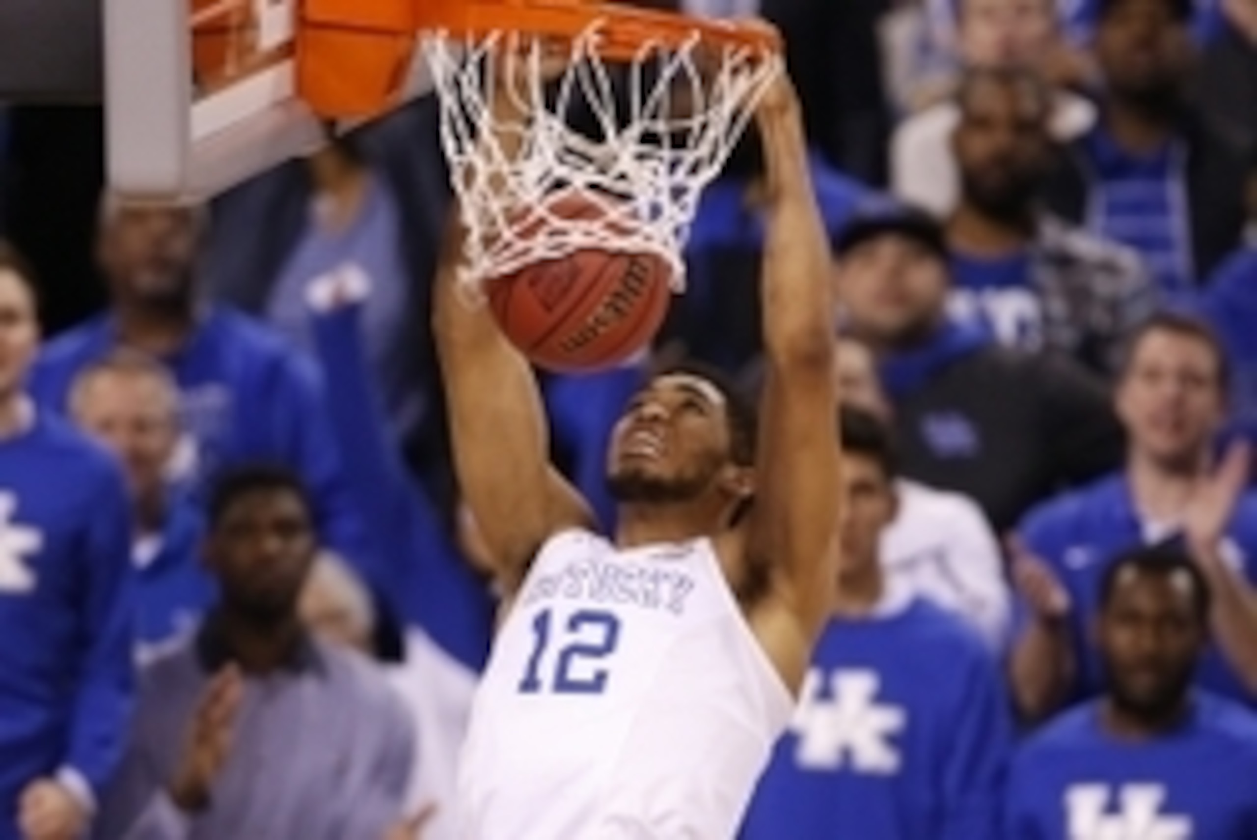Apr 4, 2015; Indianapolis, IN, USA; Kentucky Wildcats forward Karl-Anthony Towns (12) dunks during the second half of the 2015 NCAA Men's Division I Championship semi-final game against the Wisconsin Badgers at Lucas Oil Stadium. Mandatory Credit: Brian S