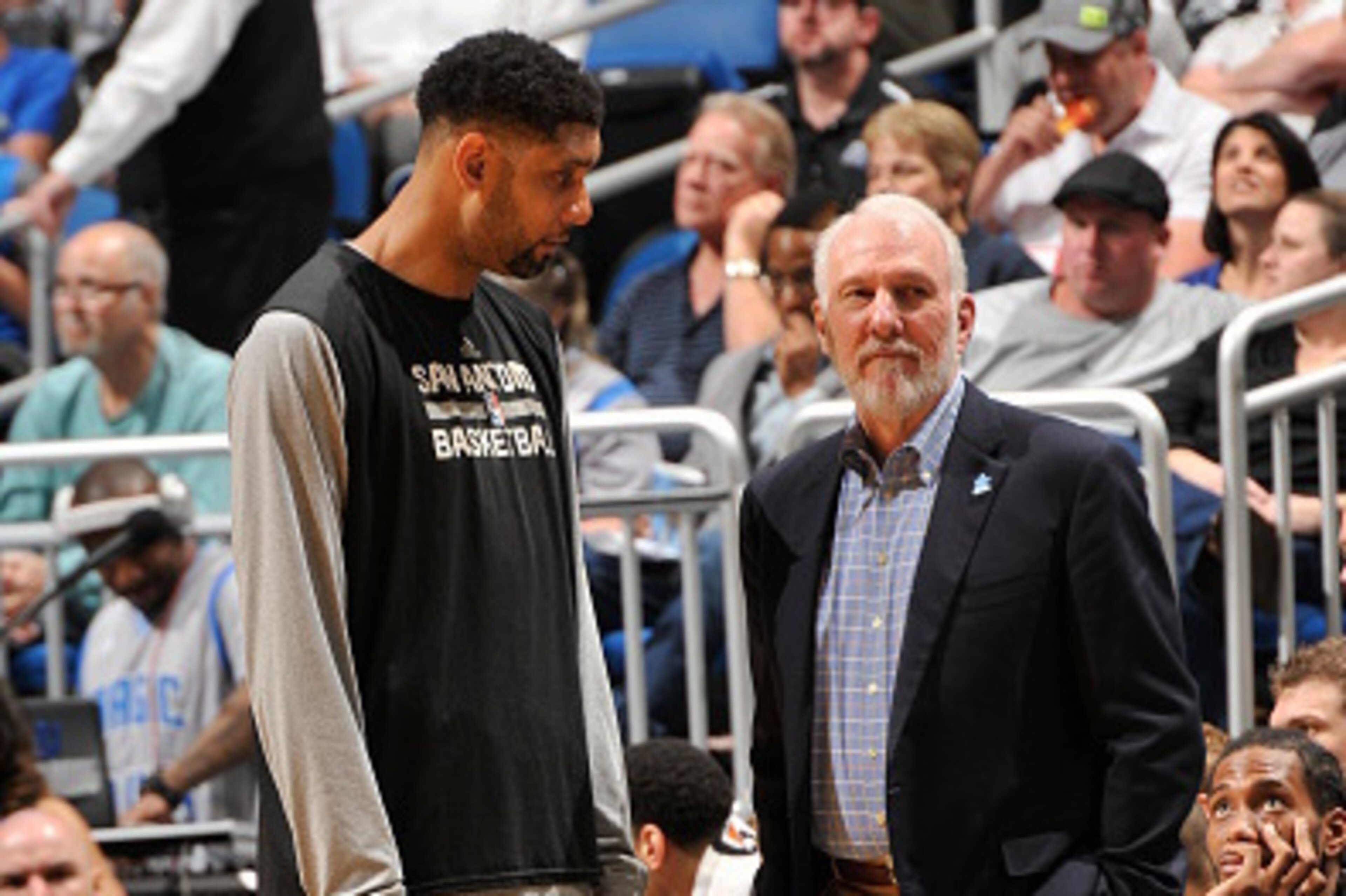 ORLANDO, FL - APRIL 1: Tim Duncan #21 and Gregg Popovich of the San Antonio Spurs speak during a game against the Orlando Magic on April 1, 2015 at Amway Center in Orlando, Florida. NOTE TO USER: User expressly acknowledges and agrees that, by downloading