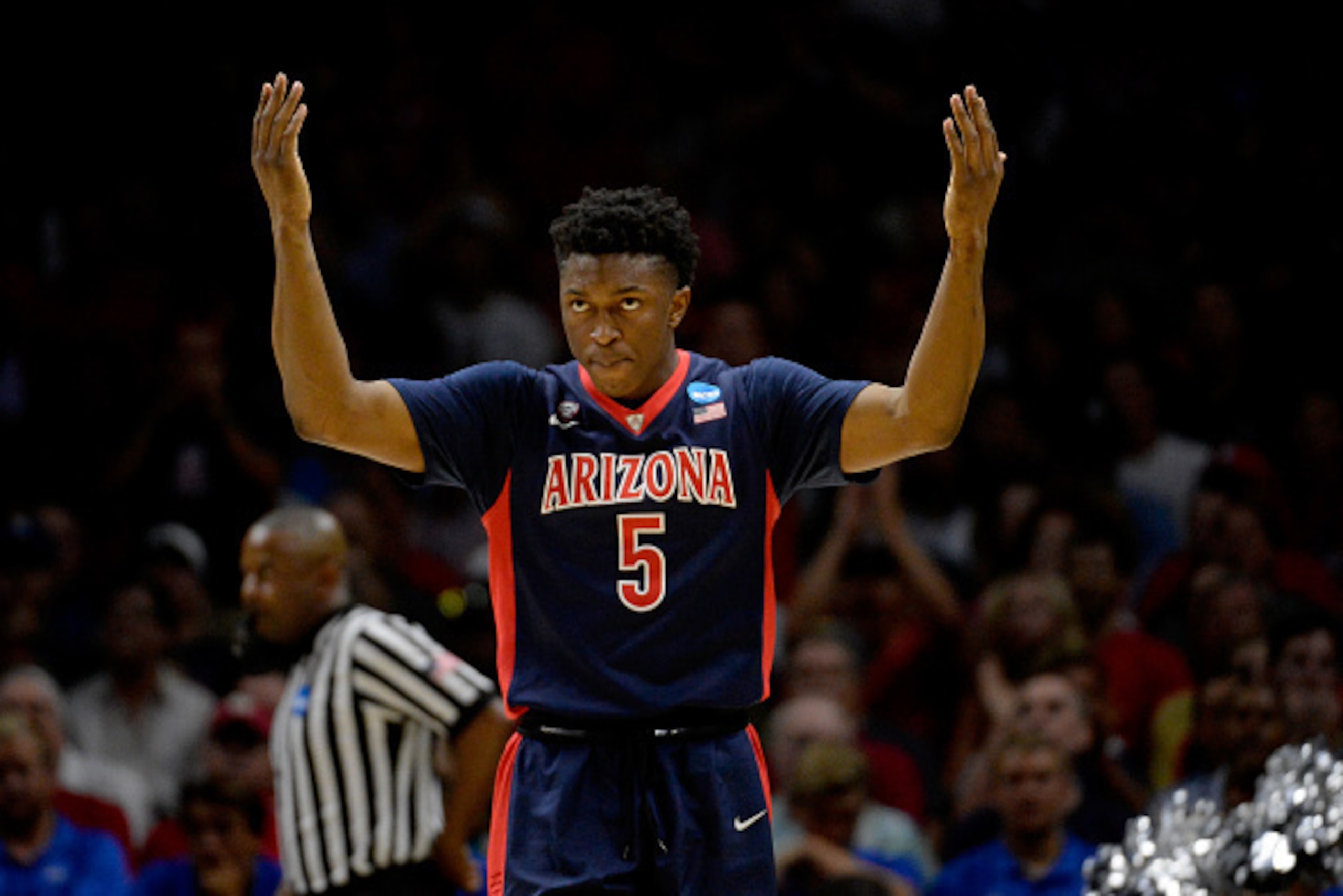 LOS ANGELES, CA - MARCH 28:  Stanley Johnson #5 of the Arizona Wildcats reacts in the first half while taking on the Wisconsin Badgers during the West Regional Final of the 2015 NCAA Men's Basketball Tournament at Staples Center on March 28, 2015 in Los A