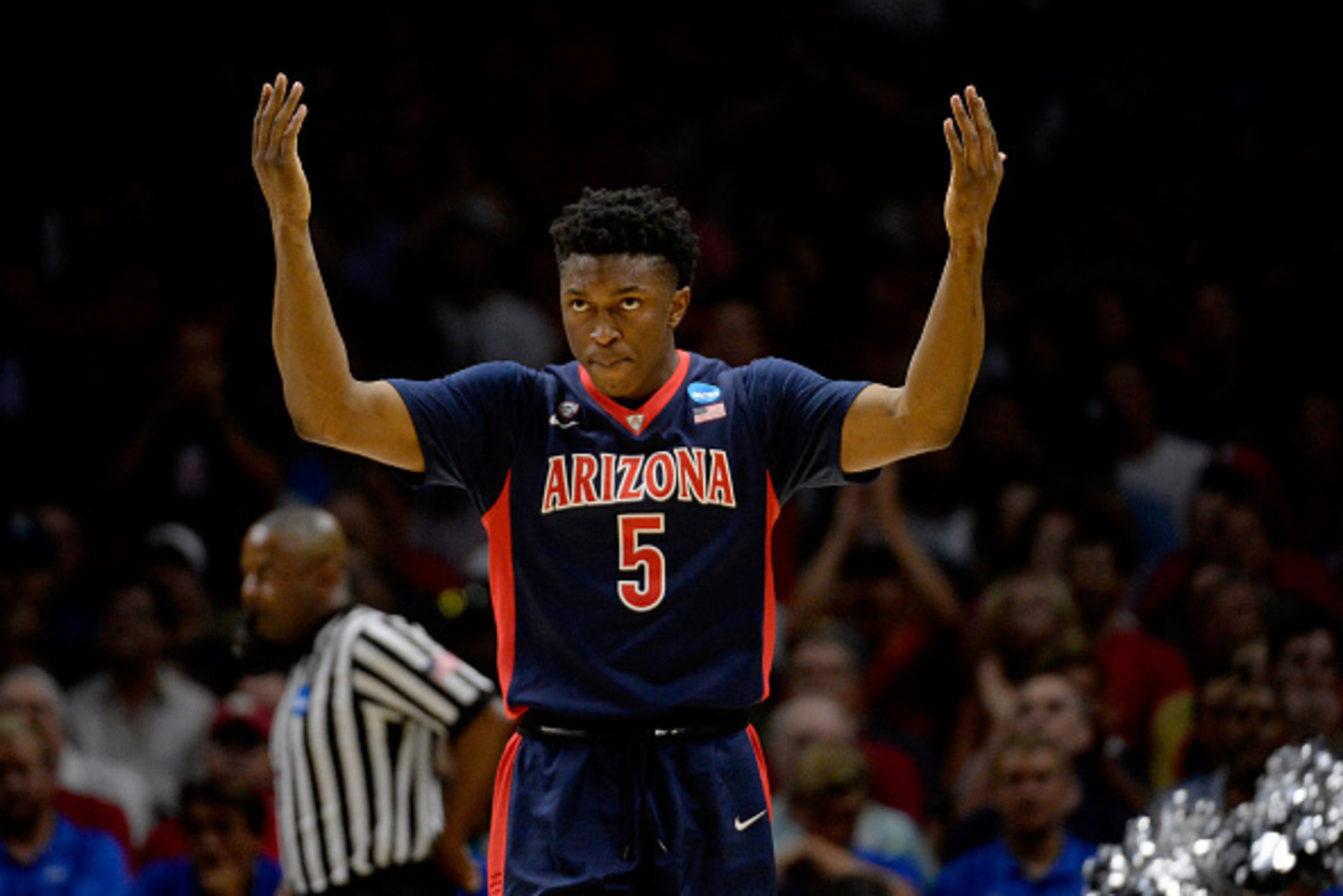LOS ANGELES, CA - MARCH 28: Stanley Johnson #5 of the Arizona Wildcats reacts in the first half while taking on the Wisconsin Badgers during the West Regional Final of the 2015 NCAA Men's Basketball Tournament at Staples Center on March 28, 2015 in Los A LOS ANGELES, CA - MARCH 28: Stanley Johnson #5 of the Arizona Wildcats reacts in the first half while taking on the Wisconsin Badgers during the West Regional Final of the 2015 NCAA Men's Basketball Tournament at Staples Center on March 28, 2015 in Los A