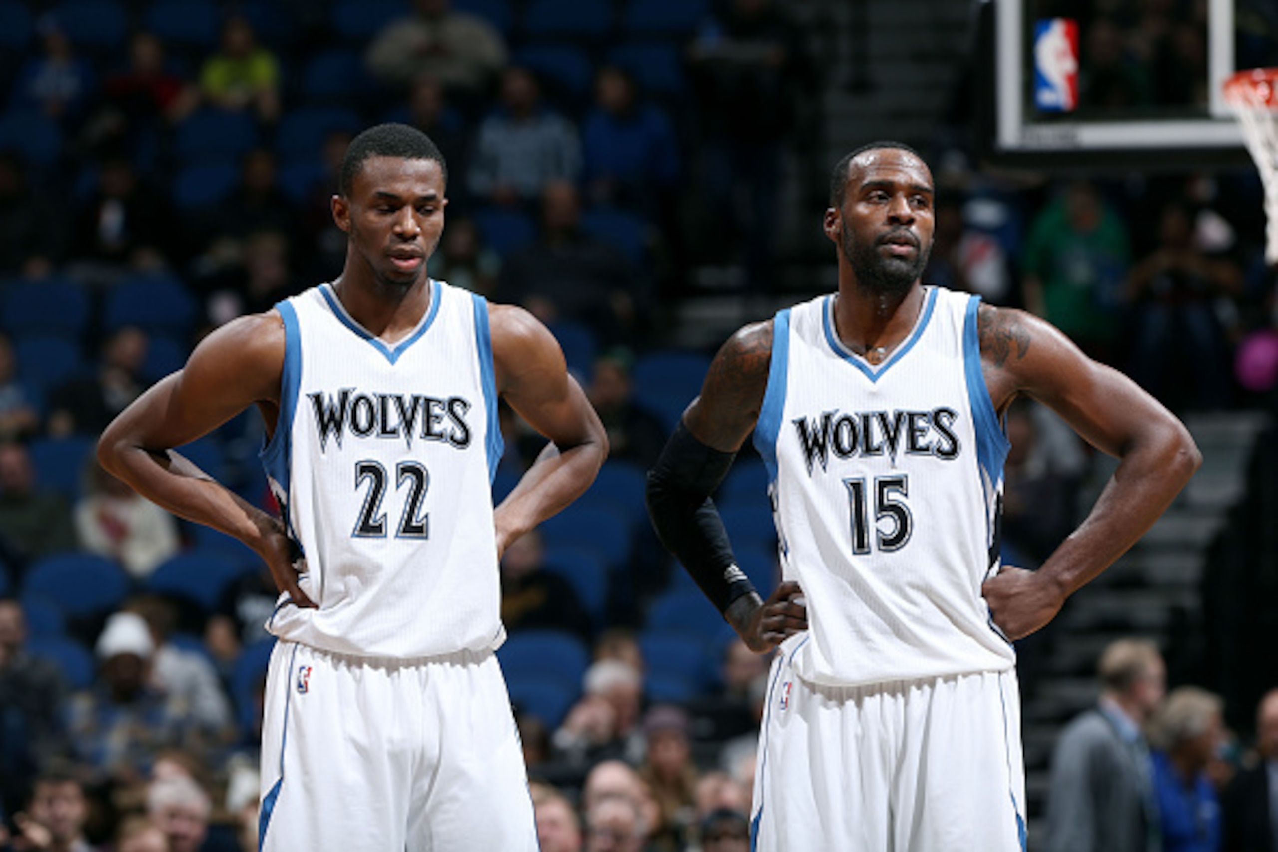 MINNEAPOLIS, MN - DECEMBER 10: Andrew Wiggins #22 and Shabazz Muhammad #15 of the Minnesota Timberwolves stand on the court during a game against the Portland Trail Blazers on December 10, 2014 at Target Center in Minneapolis, Minnesota. NOTE TO USER: Use