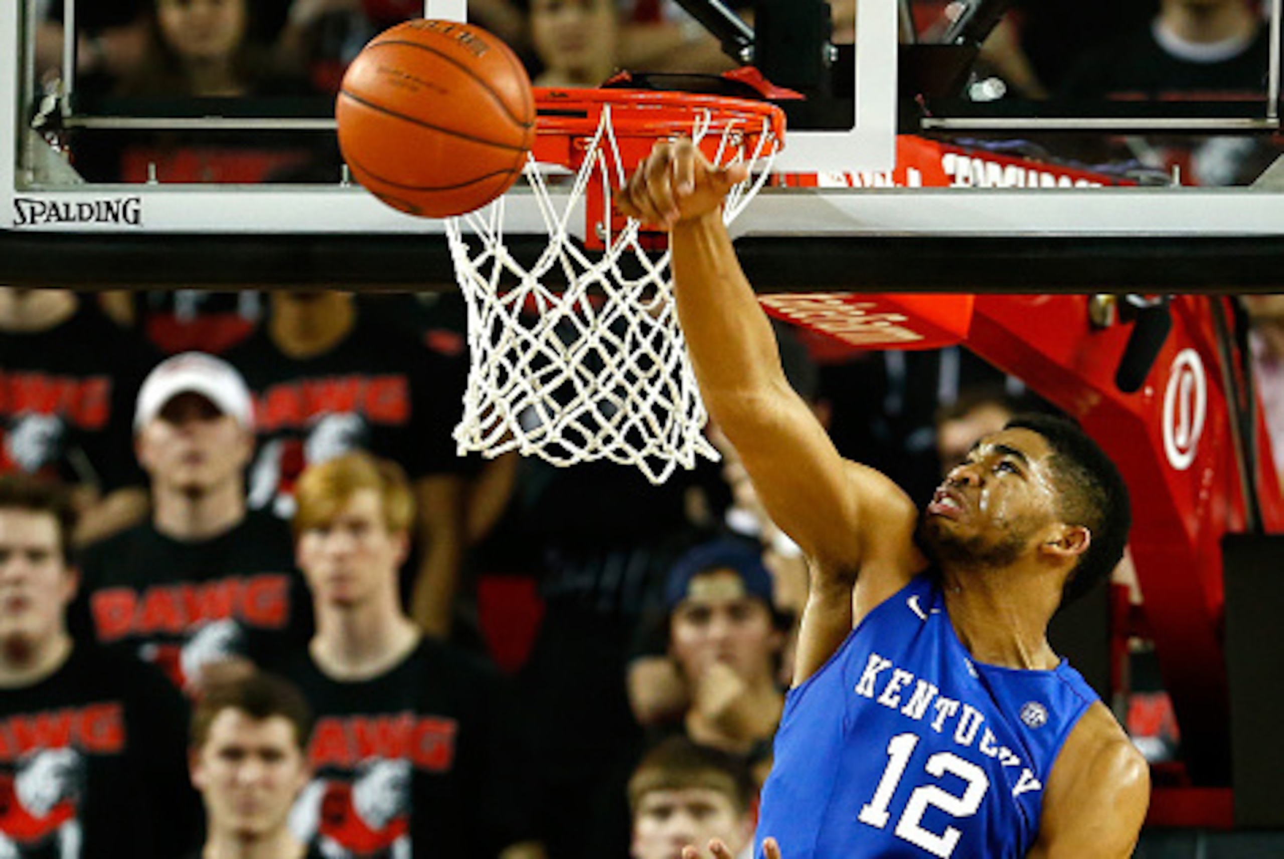 ATHENS, GA - MARCH 03:  Karl-Anthony Towns #12 of the Kentucky Wildcats blocks a shot by Charles Mann #4 of the Georgia Bulldogs at Stegeman Coliseum on March 3, 2015 in Athens, Georgia.  (Photo by Kevin C. Cox/Getty Images)