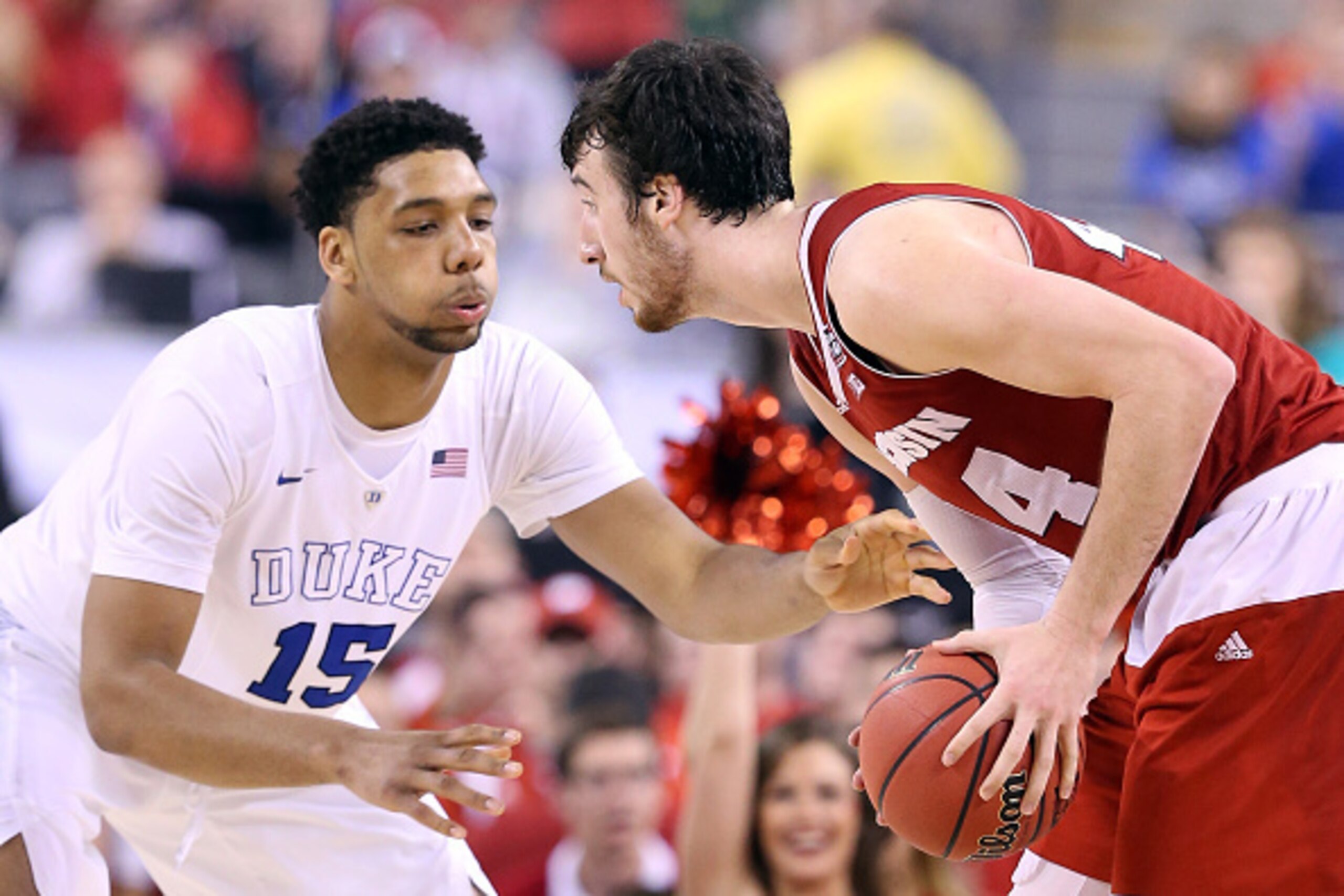 INDIANAPOLIS, IN - APRIL 06: Jahlil Okafor #15 of the Duke Blue Devils defends Frank Kaminsky #44 of the Wisconsin Badgers in the second half during the NCAA Men's Final Four National Championship at Lucas Oil Stadium on April 6, 2015 in Indianapolis, Ind INDIANAPOLIS, IN - APRIL 06: Jahlil Okafor #15 of the Duke Blue Devils defends Frank Kaminsky #44 of the Wisconsin Badgers in the second half during the NCAA Men's Final Four National Championship at Lucas Oil Stadium on April 6, 2015 in Indianapolis, Ind