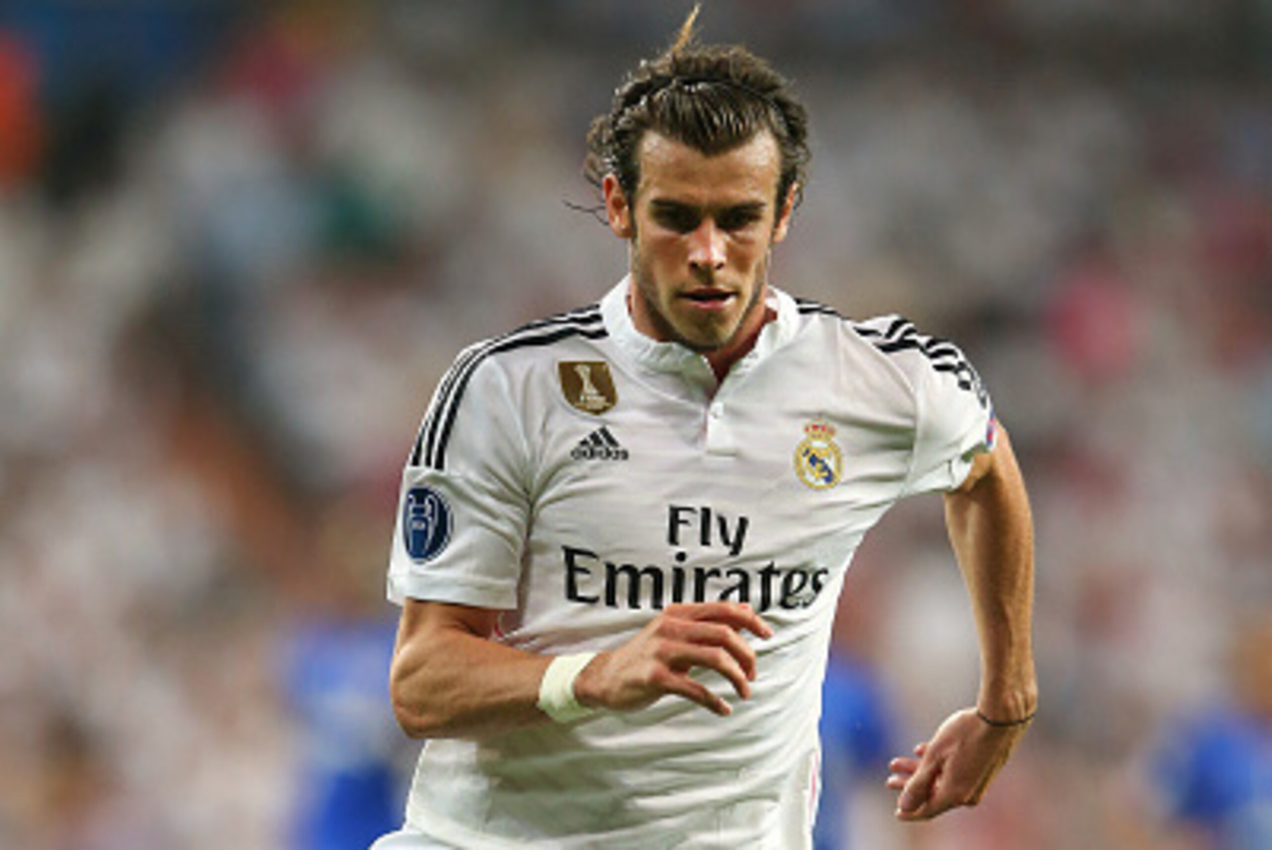 MADRID, SPAIN - MAY 13: Gareth Bale of Real Madrid CF runs with the ball during the UEFA Champions League Semi Final second leg match between Real Madrid CF and Juventus at Estadio Santiago Bernabeu on May 13, 2015 in Madrid, Spain. (Photo by Alex Lives MADRID, SPAIN - MAY 13: Gareth Bale of Real Madrid CF runs with the ball during the UEFA Champions League Semi Final second leg match between Real Madrid CF and Juventus at Estadio Santiago Bernabeu on May 13, 2015 in Madrid, Spain. (Photo by Alex Lives