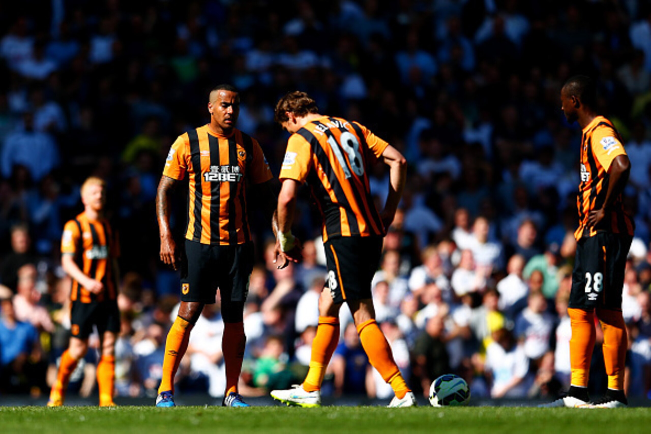 LONDON, ENGLAND - MAY 16:  Dejected Nikica Jelevic and Dame N'Doye of Hull City after conceding during the Barclays Premier League match between  Tottenham Hotspur and Hull City at White Hart Lane on May 16, 2015 in London, England.  (Photo by Julian Finn