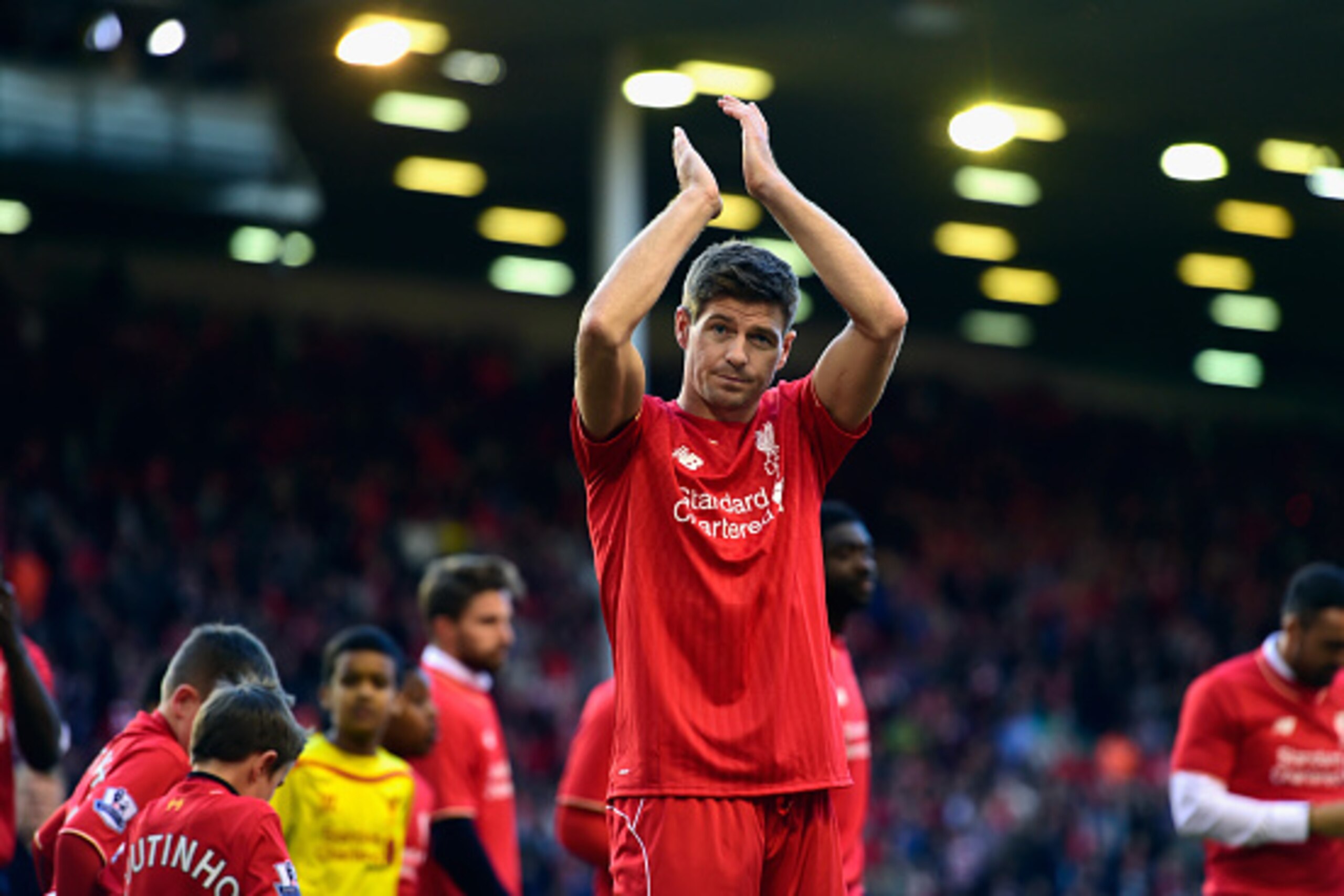 LIVERPOOL, ENGLAND - MAY 16:  Steven Gerrard of Liverpool applauds the Kop end after he Barclays Premier League match betrween Liverpool and Crystal Palace at Anfield on May 16, 2015 in Liverpool, England.  (Photo by Stu Forster/Getty Images)