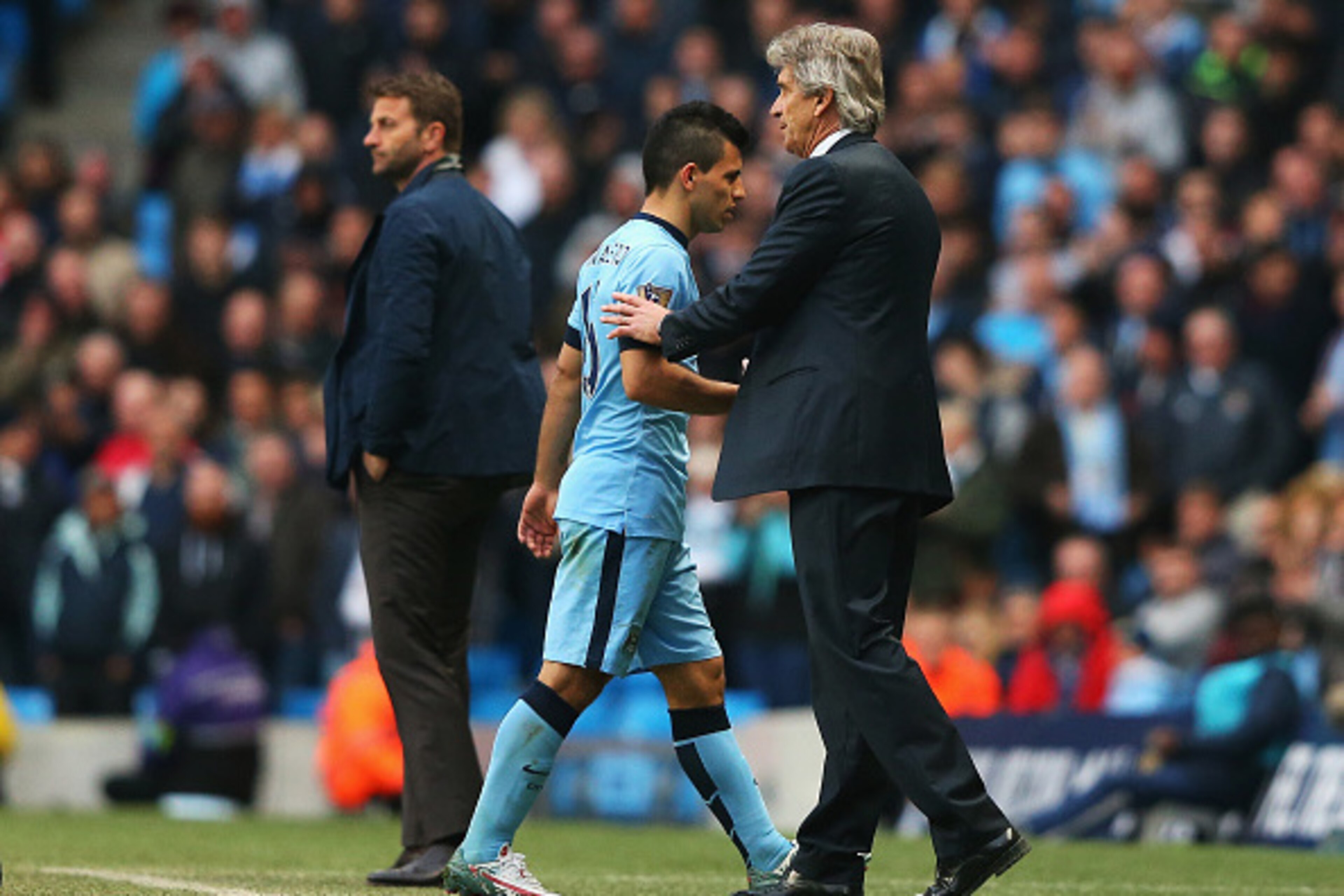 MANCHESTER, ENGLAND - APRIL 25:  Manuel Pellegrini, manager of Manchester City substitutes Sergio Aguero of Manchester City during the Barclays Premier League match between Manchester City and Aston Villa at Etihad Stadium on April 25, 2015 in Manchester,