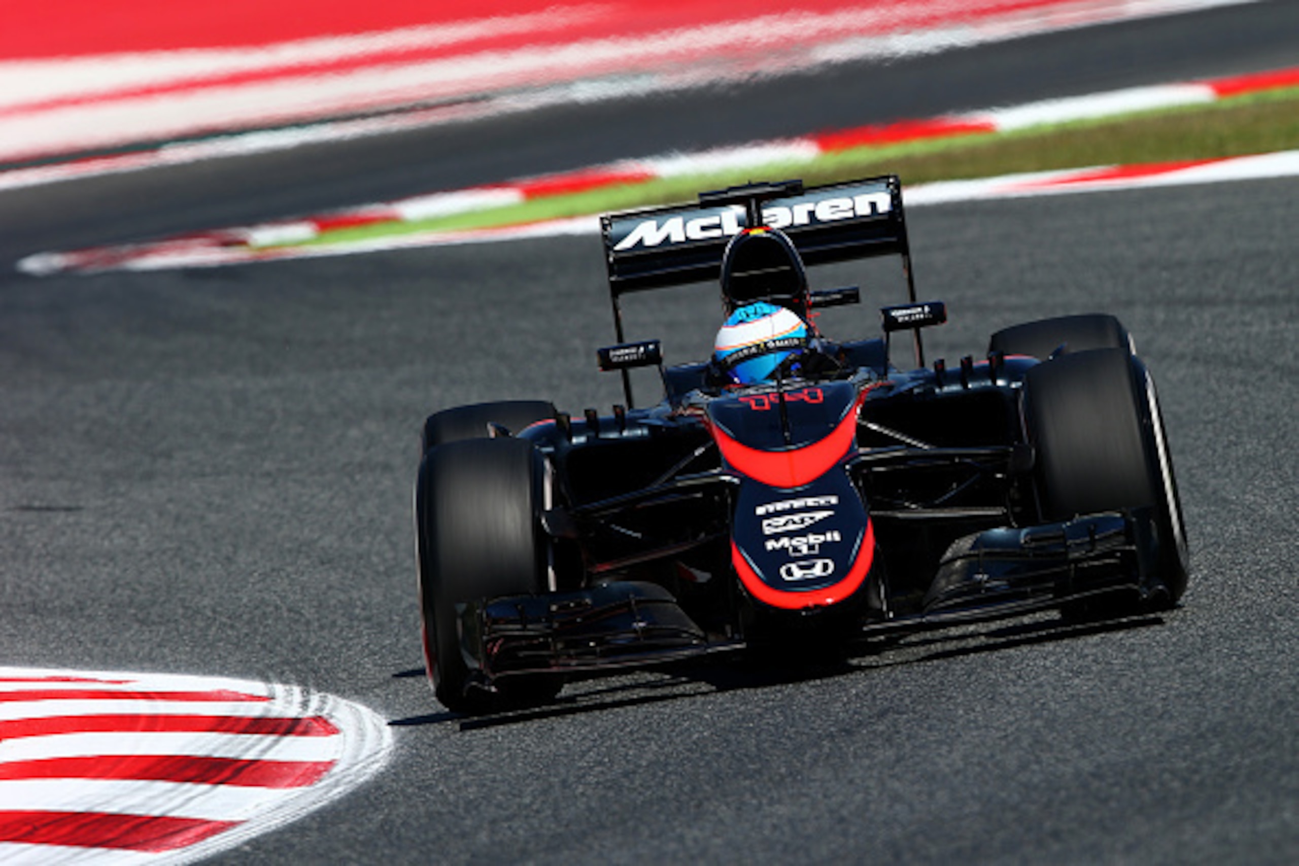 MONTMELO, SPAIN - MAY 08:  Fernando Alonso of Spain and McLaren Honda drives during practice for the Spanish Formula One Grand Prix at Circuit de Catalunya on May 8, 2015 in Montmelo, Spain.  (Photo by Mark Thompson/Getty Images)