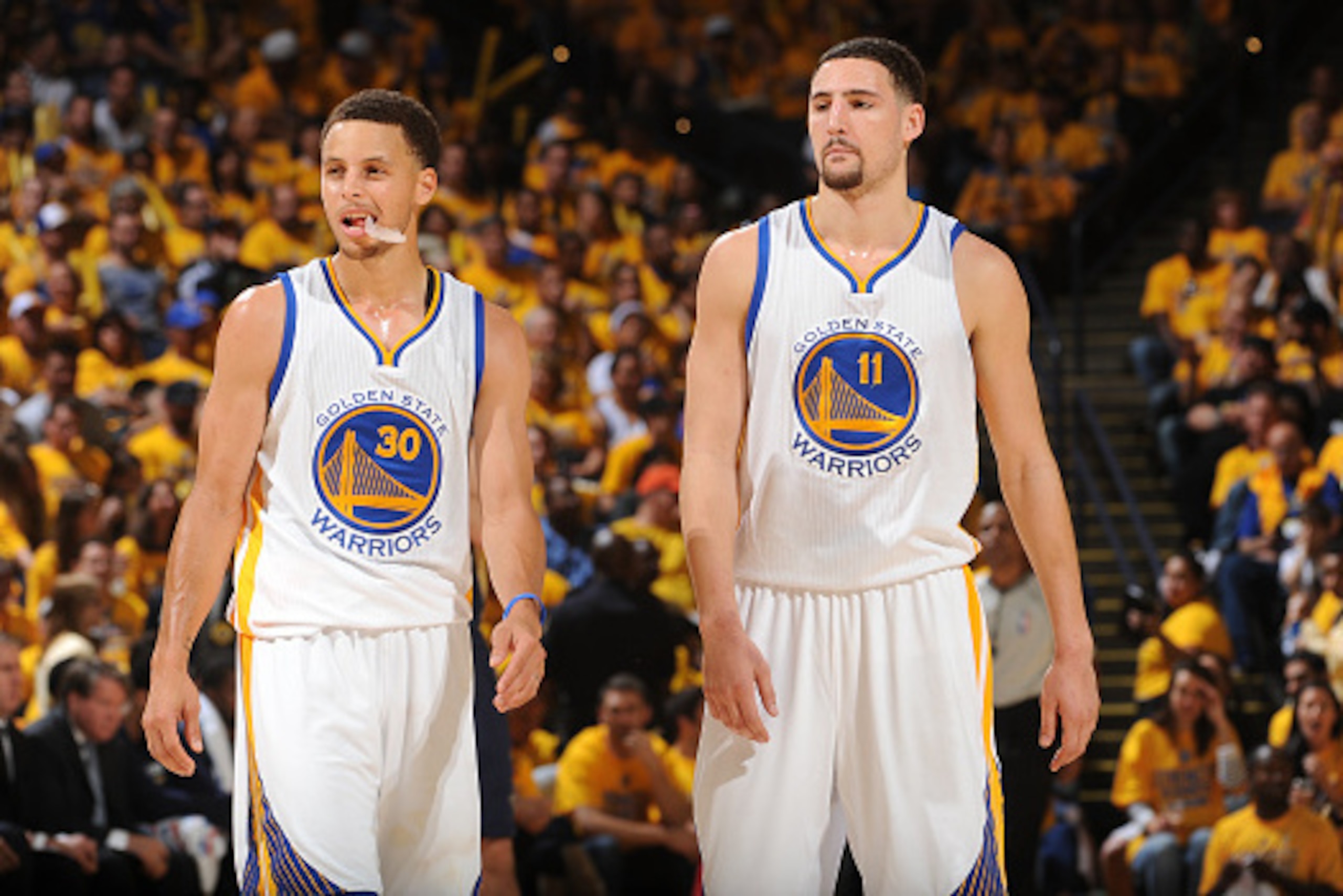 OAKLAND, CA - APRIL 18: Stephen Curry #30 of the Golden State Warriors and Klay Thompson #11 of the Golden State Warriors during Game One of the Western Conference Quarterfinals against the New Orleans Pelicans during the NBA Playoffs on April 18, 2015 at