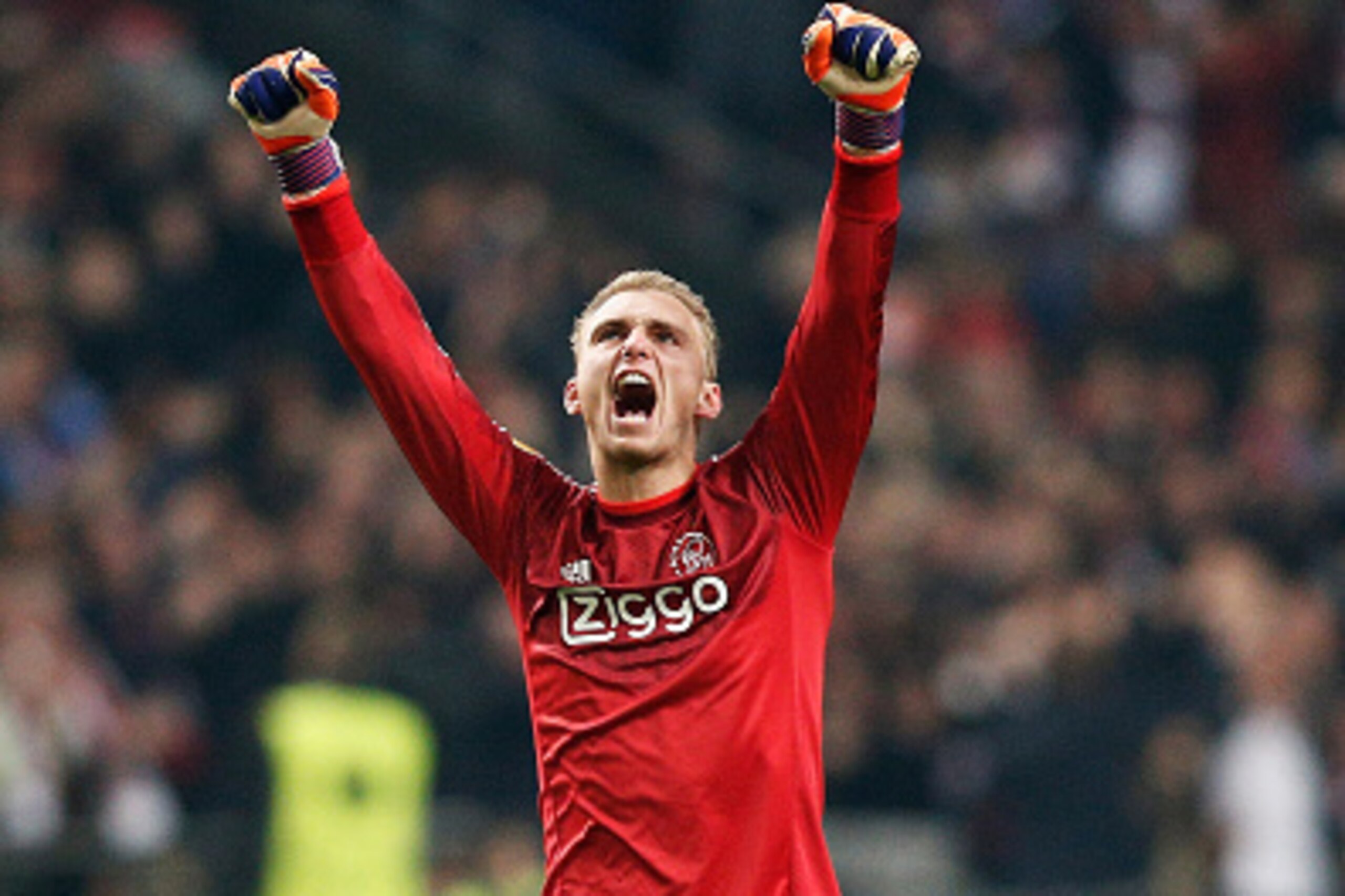 AMSTERDAM, NETHERLANDS - MARCH 19:  Goalkeeper Jasper Cillessen of Ajax celebrates after teammate Riechedly Bazoer of Ajax scores a goal to level the scores at 1-1 on aggregate during the UEFA Europa League Round of 16, second leg match between AFC Ajax v