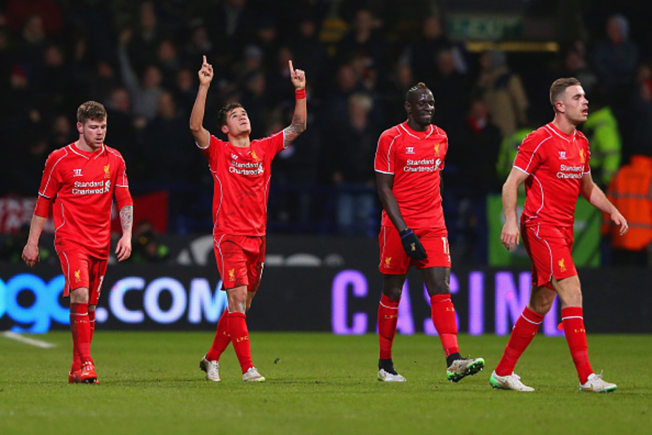 BOLTON, ENGLAND - FEBRUARY 04:  Philippe Coutinho of Liverpool celebrates scoring their second goal during the FA Cup Fourth round replay between Bolton Wanderers and Liverpool at Macron Stadium on February 4, 2015 in Bolton, England.  (Photo by Alex Live