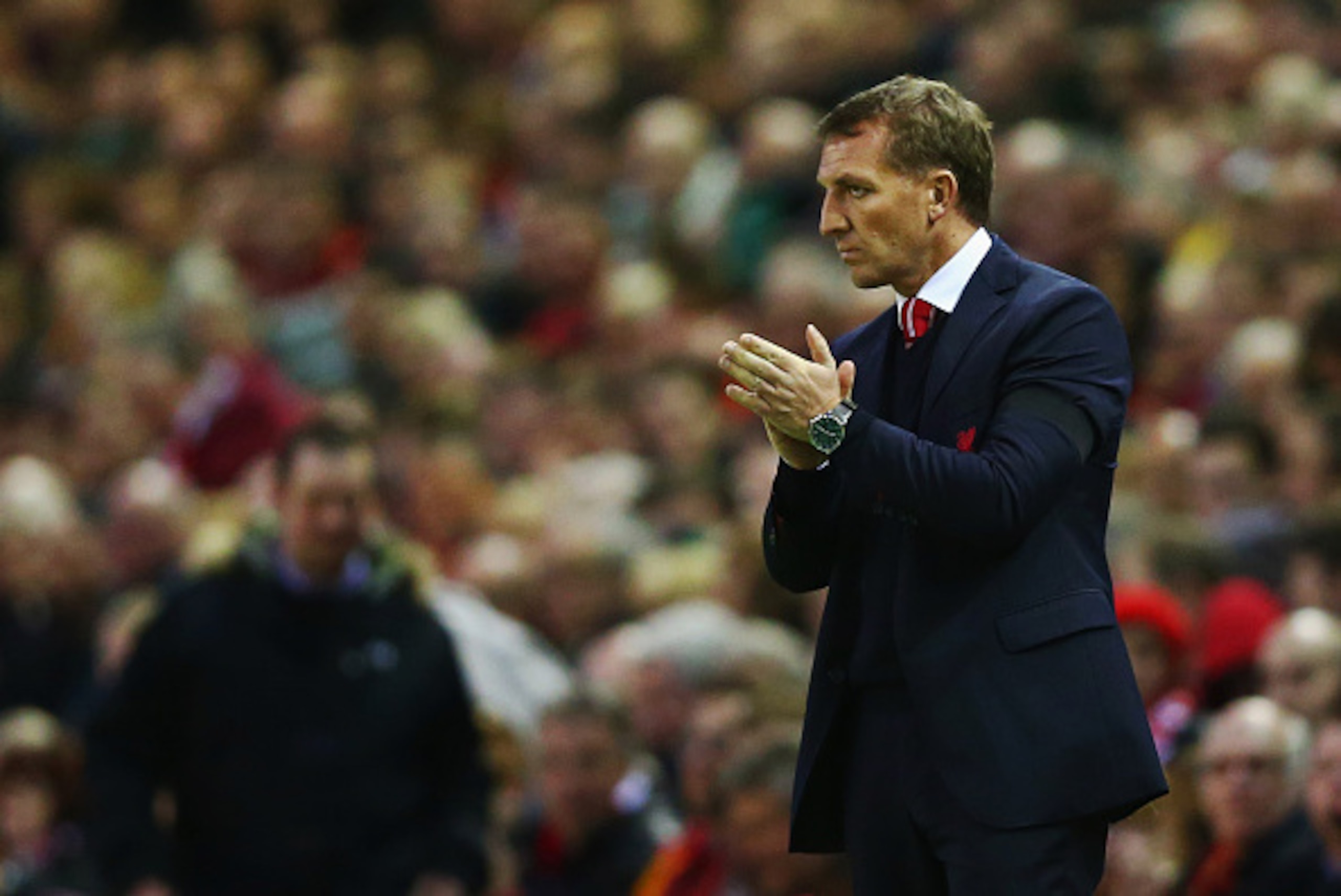 LIVERPOOL, ENGLAND - APRIL 13:  Brendan Rodgers manager of Liverpool applauds on the touchline during the Barclays Premier League match between Liverpool and Newcastle United at Anfield on April 13, 2015 in Liverpool, England.  (Photo by Clive Brunskill/G