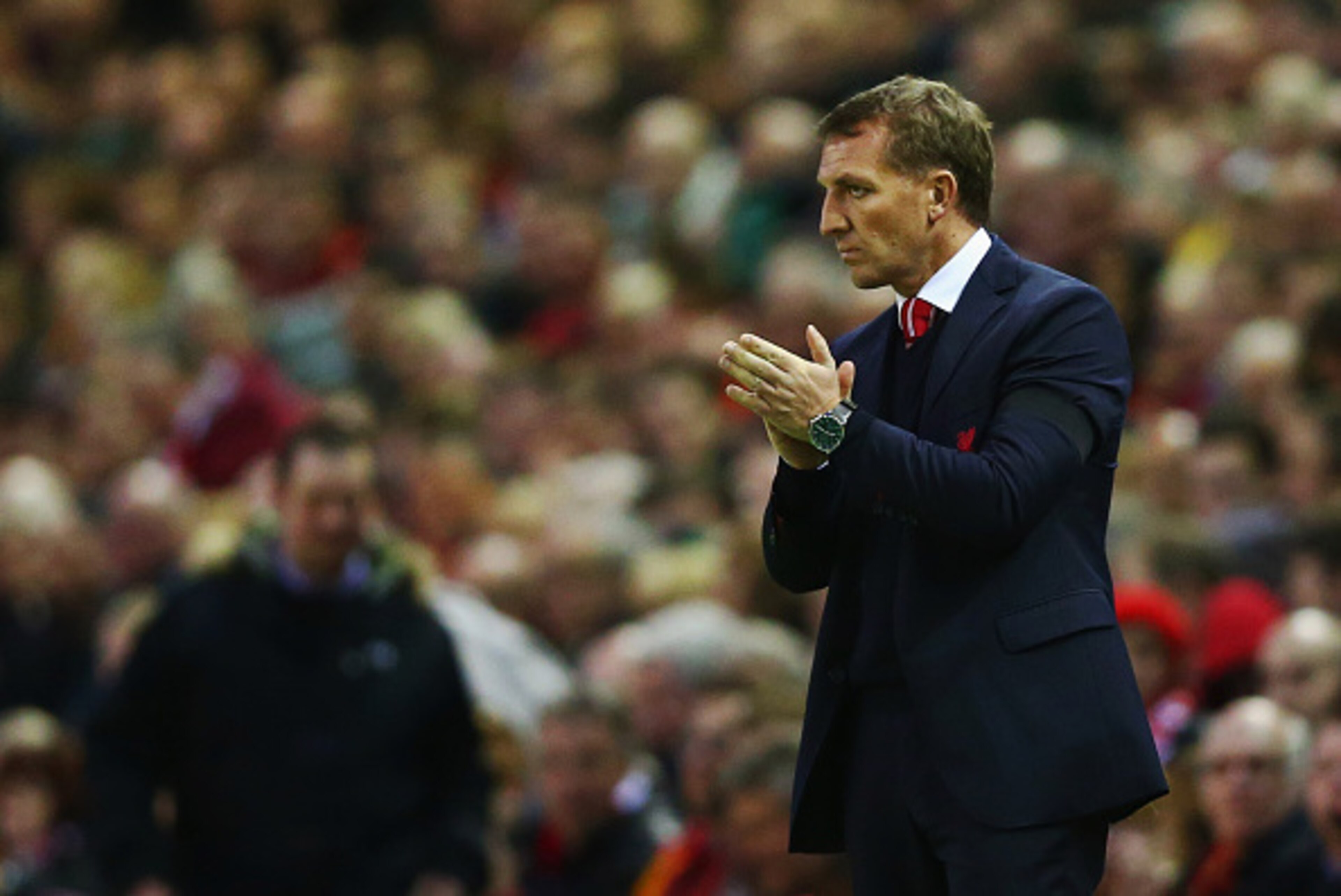 LIVERPOOL, ENGLAND - APRIL 13:  Brendan Rodgers manager of Liverpool applauds on the touchline during the Barclays Premier League match between Liverpool and Newcastle United at Anfield on April 13, 2015 in Liverpool, England.  (Photo by Clive Brunskill/G