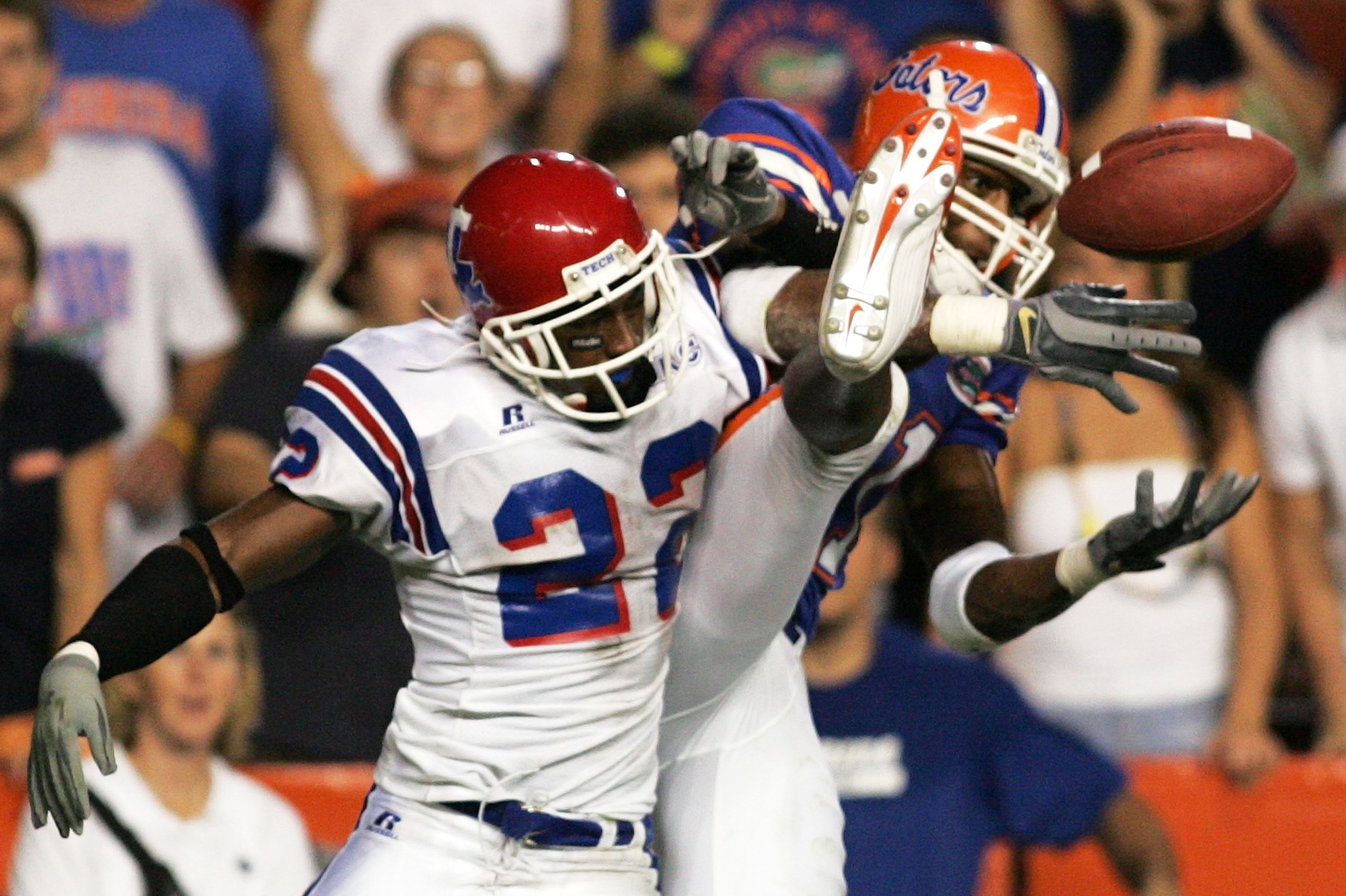 GAINESVILLE, FL - SEPTEMBER 10:   Wide receiver Dallas Baker #81 of the University of Florida Gators can't make a catch against the defense of cornerback Tramon Williams #22 of the Louisiana Tech Bulldogs at Ben Hill Griffin Stadium on September 10, 2005