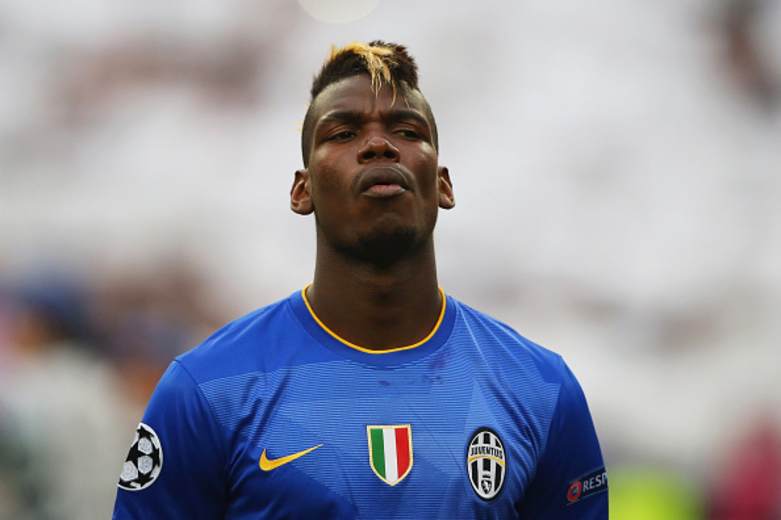 MADRID, SPAIN - MAY 13:  Paul Pogba of Juventus looks on prior to kickoff during the UEFA Champions League Semi Final, second leg match between Real Madrid and Juventus at Estadio Santiago Bernabeu on May 13, 2015 in Madrid, Spain.  (Photo by Alex Livesey