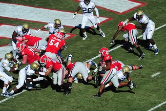 ATHENS, GA - NOVEMBER 29: Nick Chubb #27 of the Georgia Bulldogs carries the ball for a first half touchdown against the Georgia Tech Yellow Jackets at Sanford Stadium on November 29, 2014 in Athens, Georgia. (Photo by Scott Cunningham/Getty Images)