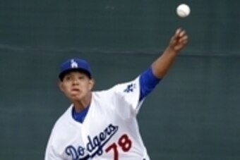 Feb 23, 2015; Glendale, AZ, USA; Los Angeles Dodgers pitcher Julio Urias (78) throws in the bullpen during camp at Camelback Ranch. Mandatory Credit: Rick Scuteri-USA TODAY Sports