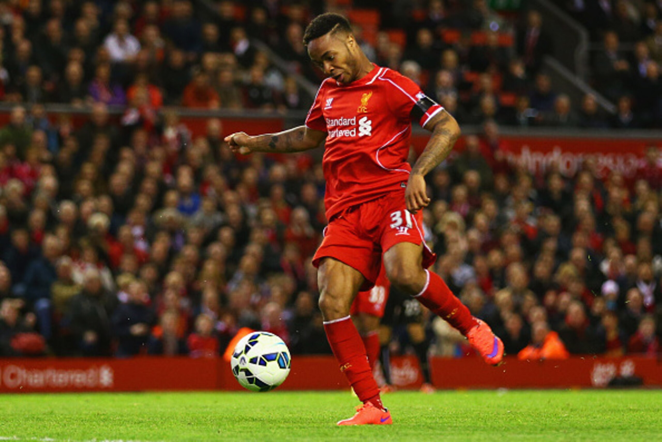 LIVERPOOL, ENGLAND - APRIL 13:  Raheem Sterling of Liverpool misses a chance during the Barclays Premier League match between Liverpool and Newcastle United at Anfield on April 13, 2015 in Liverpool, England.  (Photo by Clive Brunskill/Getty Images)