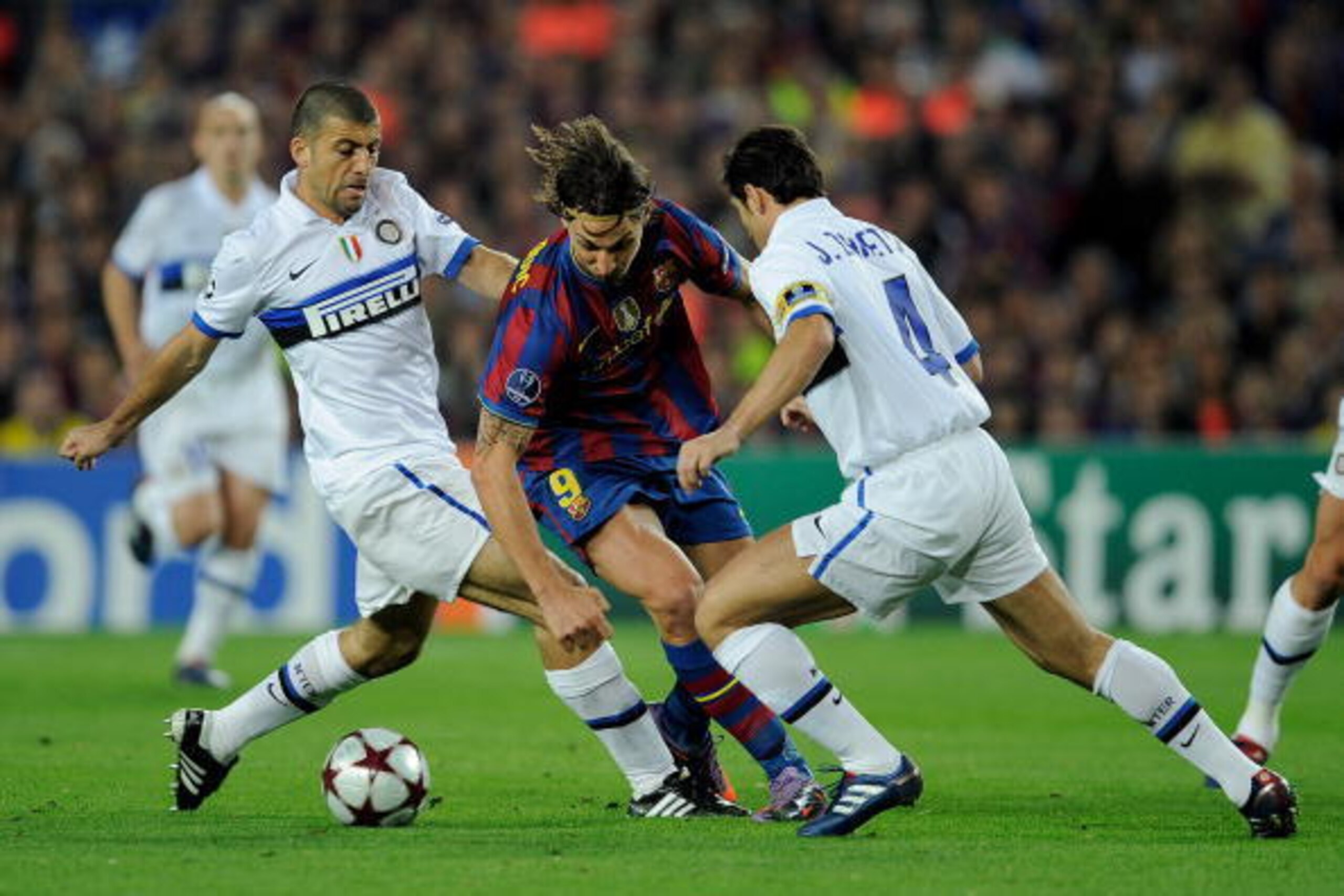BARCELONA, SPAIN - APRIL 28: Walter Samuel and Javier Zanetti of Inter Milan challenge Zlatan Ibrahimovic of Barcelona during the UEFA Champions League Semi Final Second Leg match between Barcelona and Inter Milan at Camp Nou on April 28, 2010 in Barcelon