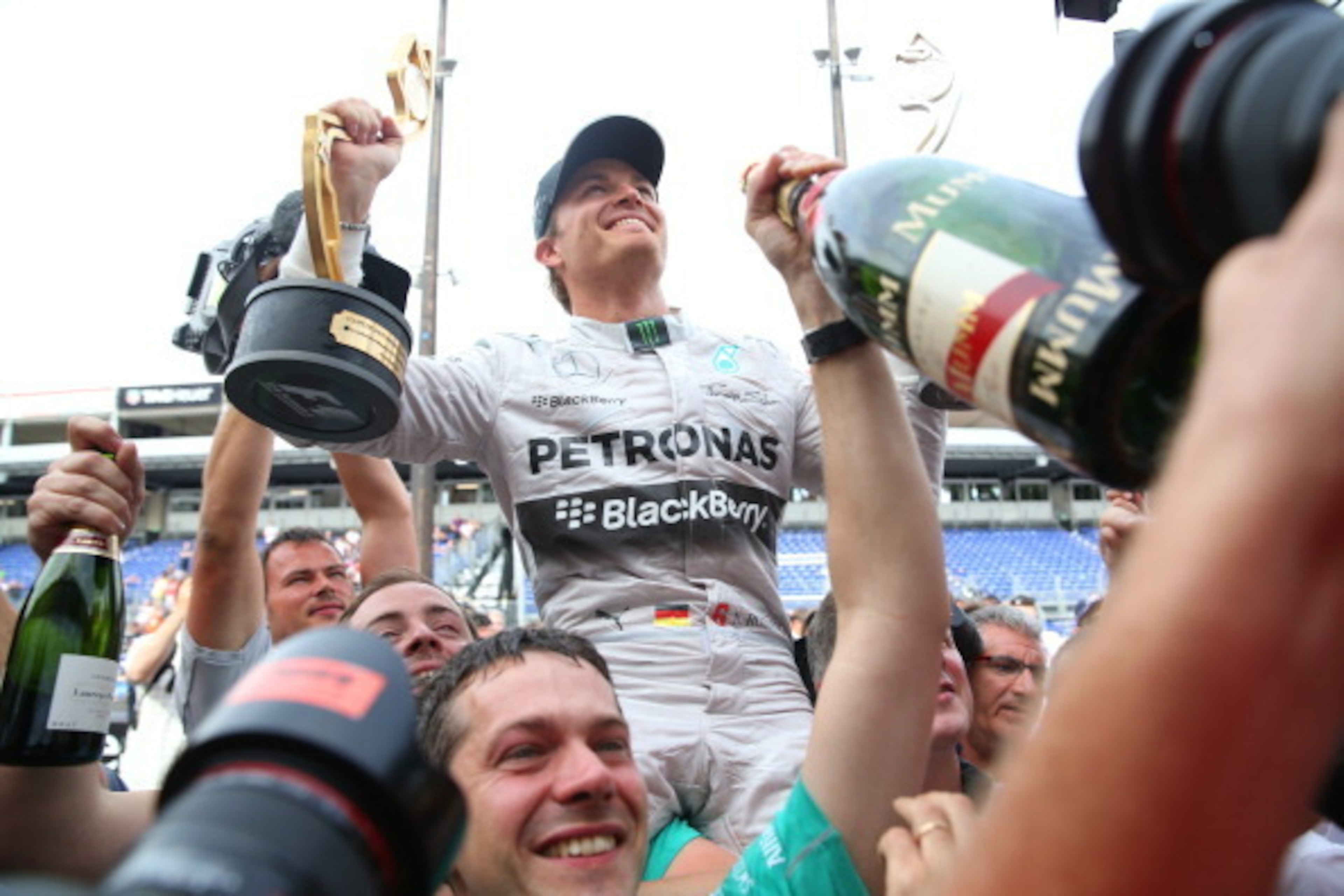 MONTE-CARLO, MONACO - MAY 25:  Nico Rosberg of Germany and Mercedes GP is carried aloft by his team following his victory during the Monaco Formula One Grand Prix at Circuit de Monaco on May 25, 2014 in Monte-Carlo, Monaco.  (Photo by Mark Thompson/Getty 