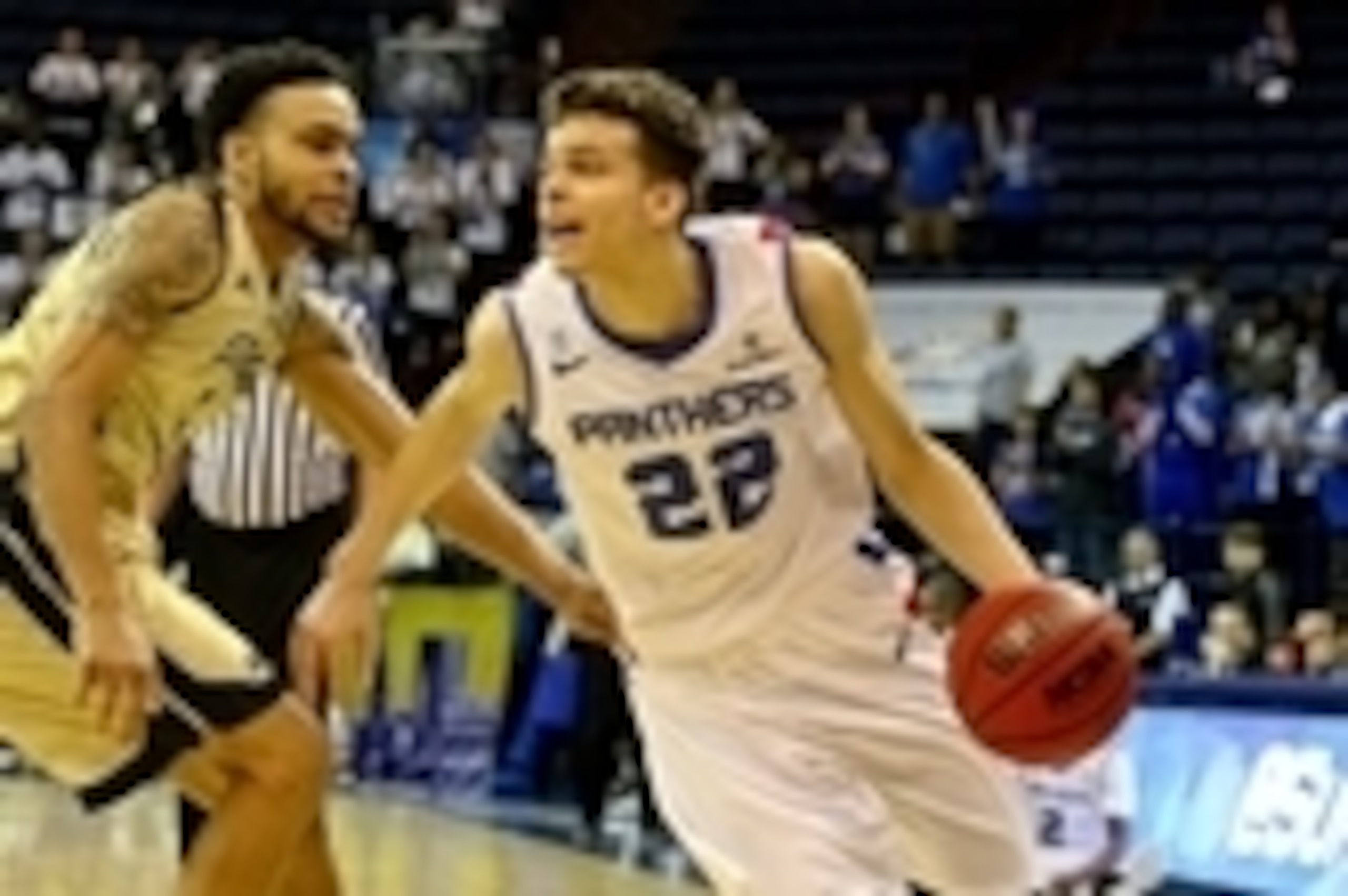 Mar 15, 2015; New Orleans, LA, USA; Georgia State Panthers guard R.J. Hunter (22) drives past Georgia Southern Eagles guard Curtis Diamond (4) during the first half of the Sun Belt Conference Tournament Championship game at the Lakefront Arena. Mandatory 