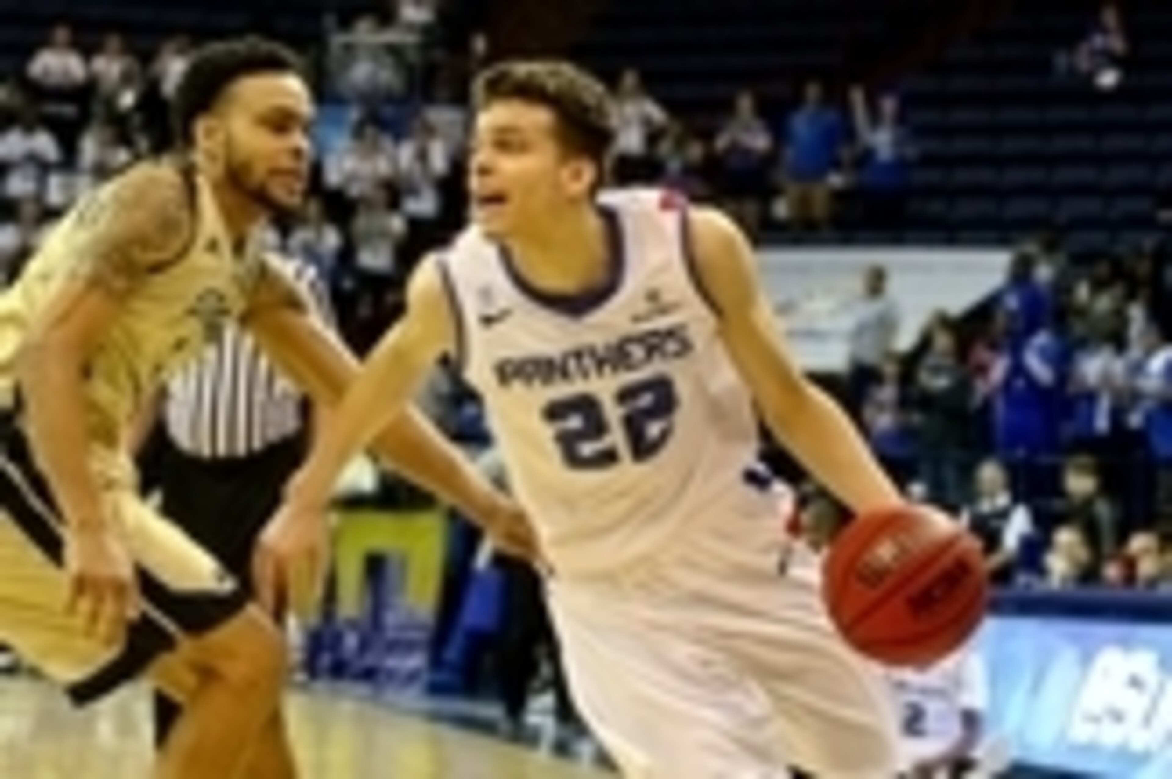 Mar 15, 2015; New Orleans, LA, USA; Georgia State Panthers guard R.J. Hunter (22) drives past Georgia Southern Eagles guard Curtis Diamond (4) during the first half of the Sun Belt Conference Tournament Championship game at the Lakefront Arena. Mandatory 