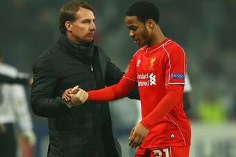 ISTANBUL, TURKEY - FEBRUARY 26:  Brendan Rodgers manager of Liverpool shakes hands with Raheem Sterling of Liverpool after defeat in a penalty shoot out during the UEFA Europa League Round of 32 second leg match between Besiktas JK and Liverpool FC on Feb