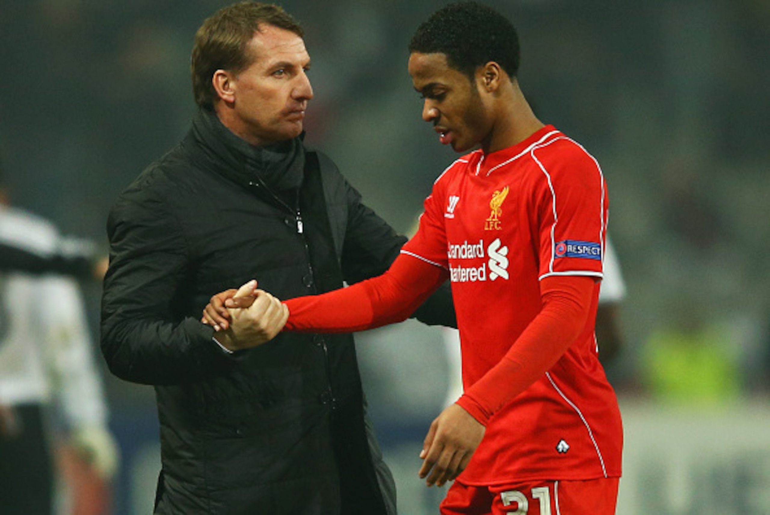 ISTANBUL, TURKEY - FEBRUARY 26: Brendan Rodgers manager of Liverpool shakes hands with Raheem Sterling of Liverpool after defeat in a penalty shoot out during the UEFA Europa League Round of 32 second leg match between Besiktas JK and Liverpool FC on Feb ISTANBUL, TURKEY - FEBRUARY 26: Brendan Rodgers manager of Liverpool shakes hands with Raheem Sterling of Liverpool after defeat in a penalty shoot out during the UEFA Europa League Round of 32 second leg match between Besiktas JK and Liverpool FC on Feb