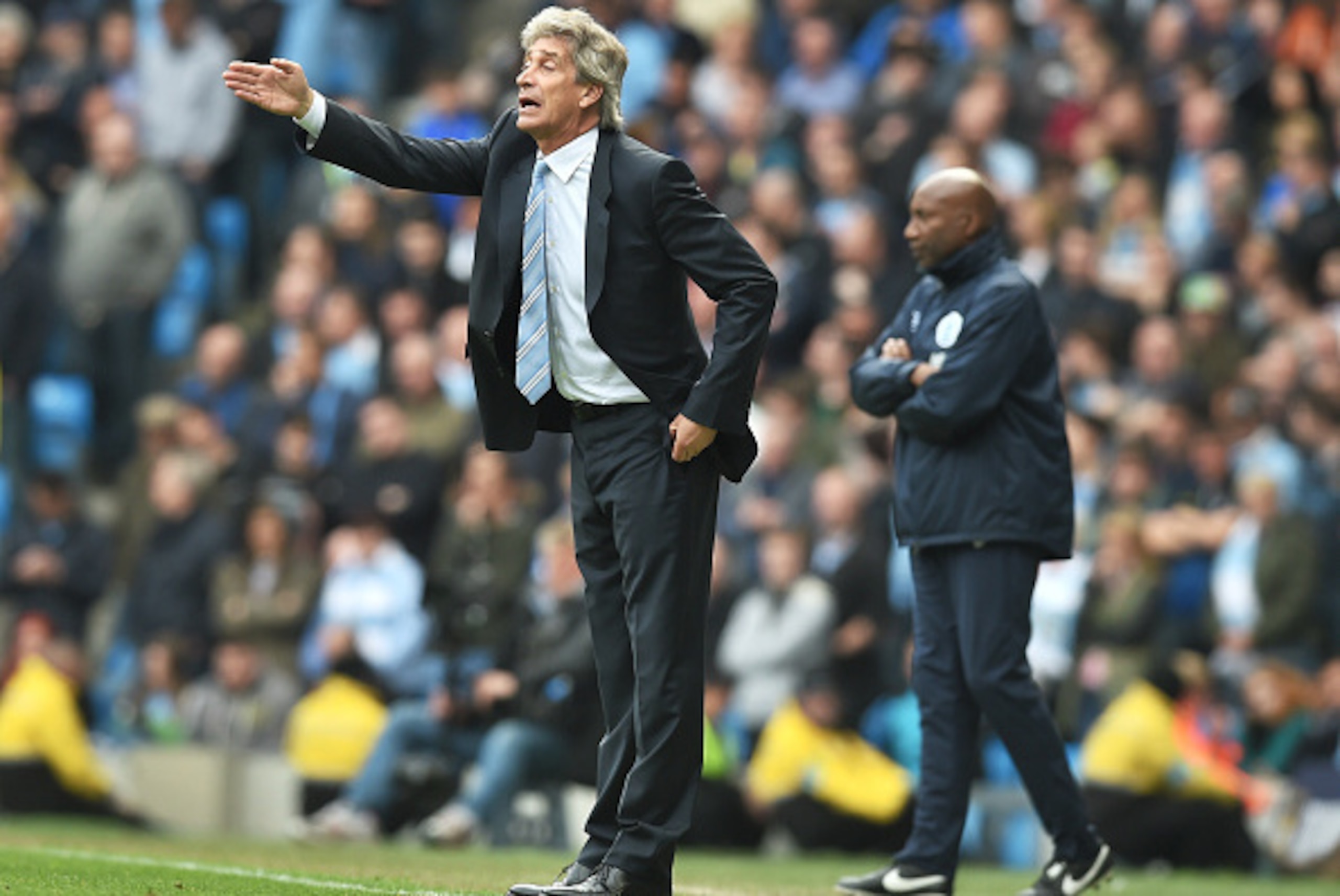 MANCHESTER, ENGLAND - MAY 10: Manuel Pellegrini the manager of Manchester City directs his players during the Barclays Premier League match between Manchester City and Queens Park Rangers at the Etihad Stadium on May 10, 2015 in Manchester, England. (Ph MANCHESTER, ENGLAND - MAY 10: Manuel Pellegrini the manager of Manchester City directs his players during the Barclays Premier League match between Manchester City and Queens Park Rangers at the Etihad Stadium on May 10, 2015 in Manchester, England. (Ph