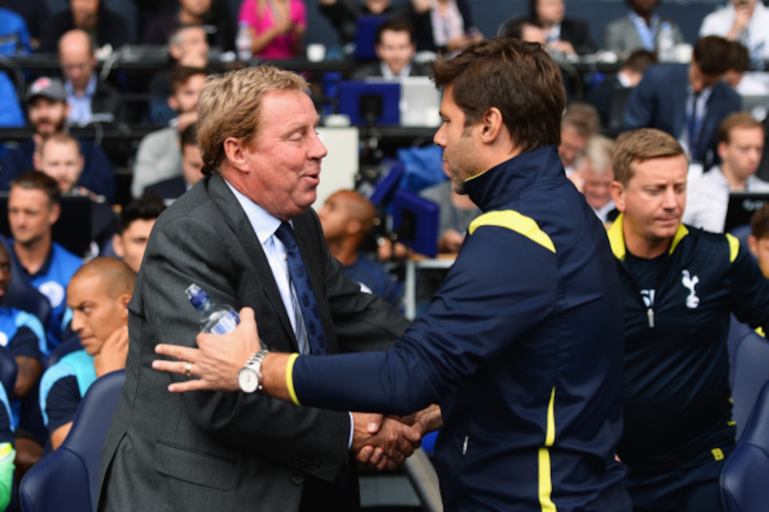 LONDON, ENGLAND - AUGUST 24: Harry Redknapp (L), the QPR manager shakes hands with Mauricio Pochettino, the Spurs manager prior to the Barclays Premier League match between Tottenham Hotspur and Queens Park Rangers at White Hart Lane on August 24, 2014 in LONDON, ENGLAND - AUGUST 24: Harry Redknapp (L), the QPR manager shakes hands with Mauricio Pochettino, the Spurs manager prior to the Barclays Premier League match between Tottenham Hotspur and Queens Park Rangers at White Hart Lane on August 24, 2014 in