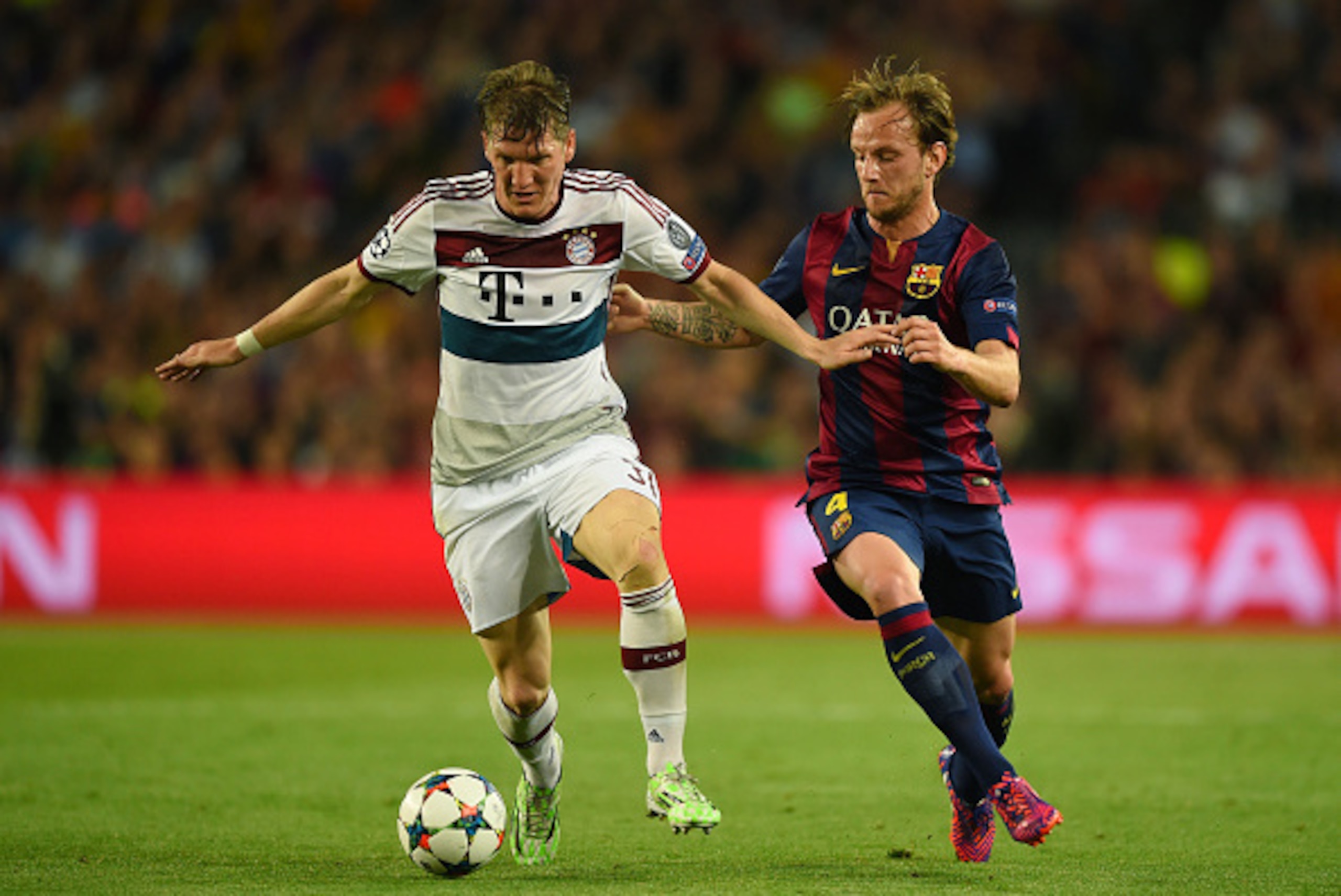 BARCELONA, SPAIN - MAY 06:  Bastian Schweinsteiger of Bayern Muenchen is challenged by Ivan Rakitic of Barcelona during the UEFA Champions League Semi Final, first leg match between FC Barcelona and FC Bayern Muenchen at Camp Nou on May 6, 2015 in Barcelo