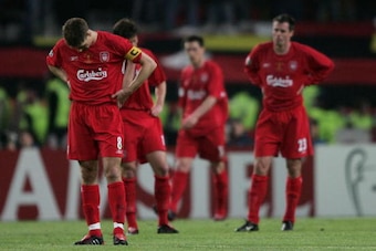 ISTANBUL, TURKEY - MAY 25:  Liverpool captain Steven Gerrard (L), Liverpool midfielder Xabi Alonso of Spain (C) and Liverpool defender Jamie Carragher (R) react during the European Champions League final between Liverpool and AC Milan on May 25, 2005 at t