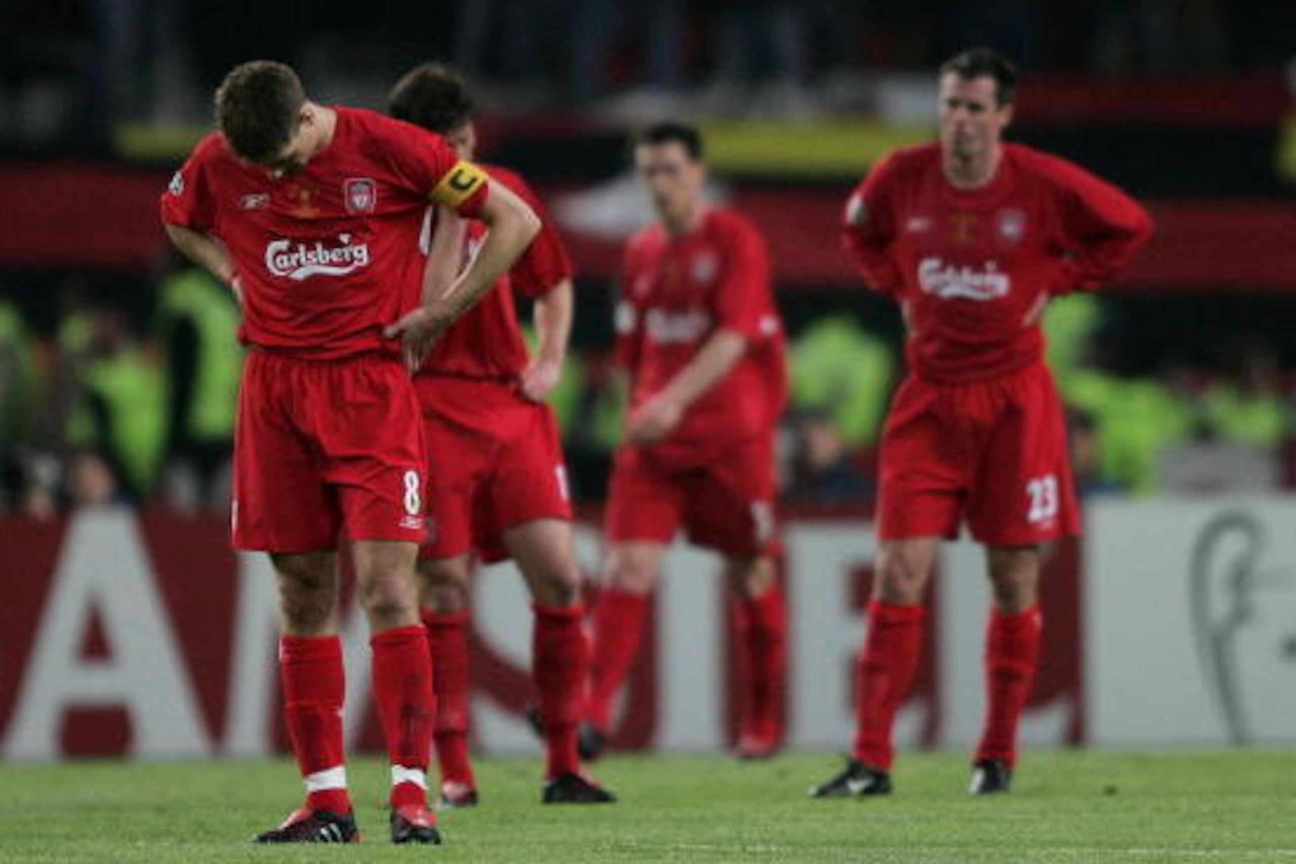 ISTANBUL, TURKEY - MAY 25:  Liverpool captain Steven Gerrard (L), Liverpool midfielder Xabi Alonso of Spain (C) and Liverpool defender Jamie Carragher (R) react during the European Champions League final between Liverpool and AC Milan on May 25, 2005 at t