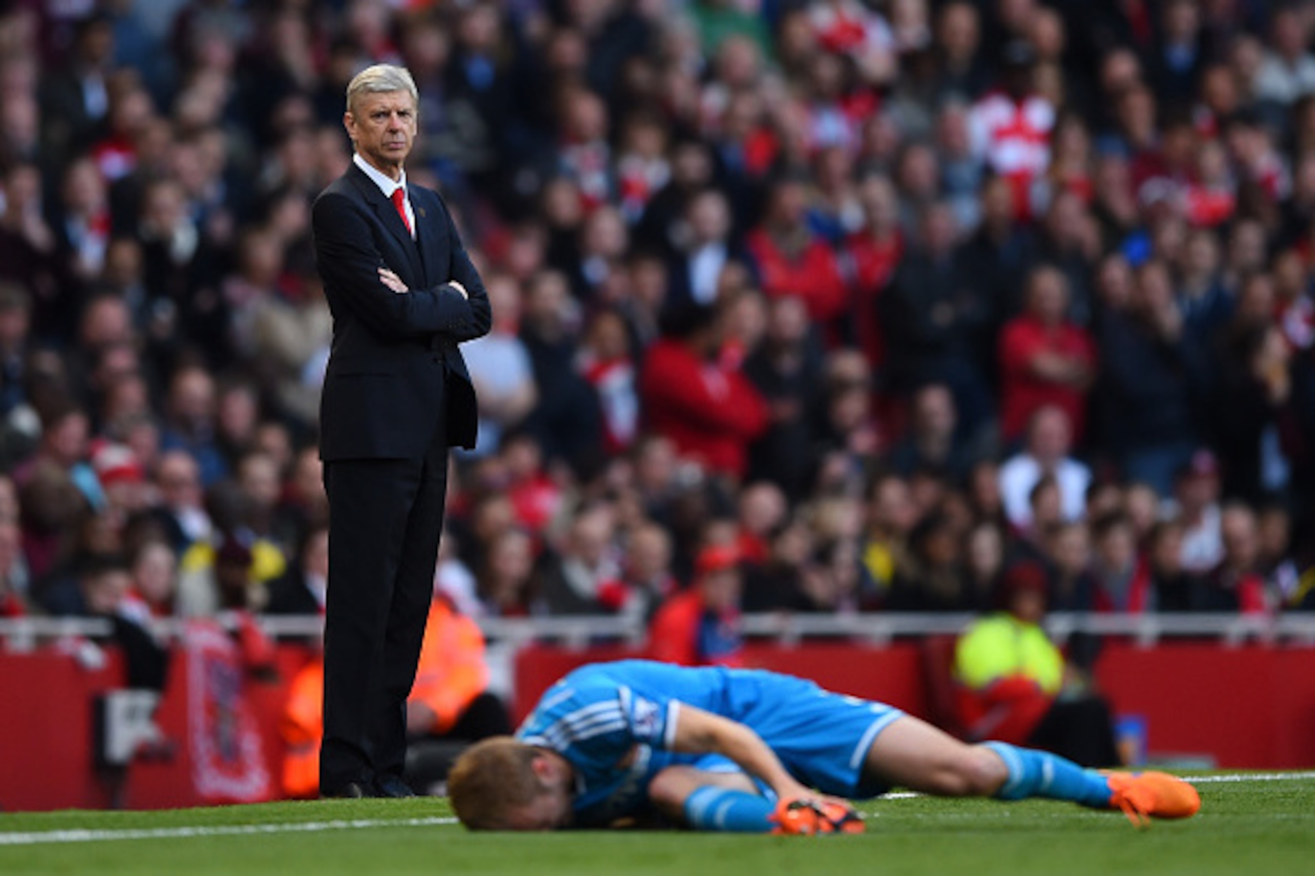LONDON, ENGLAND - MAY 20: Arsene Wenger manager of Arsenal looks on as Sebastian Larsson of Sunderland lies injured during the Barclays Premier League match between Arsenal and Sunderland at Emirates Stadium on May 20, 2015 in London, England. (Photo by LONDON, ENGLAND - MAY 20: Arsene Wenger manager of Arsenal looks on as Sebastian Larsson of Sunderland lies injured during the Barclays Premier League match between Arsenal and Sunderland at Emirates Stadium on May 20, 2015 in London, England. (Photo by