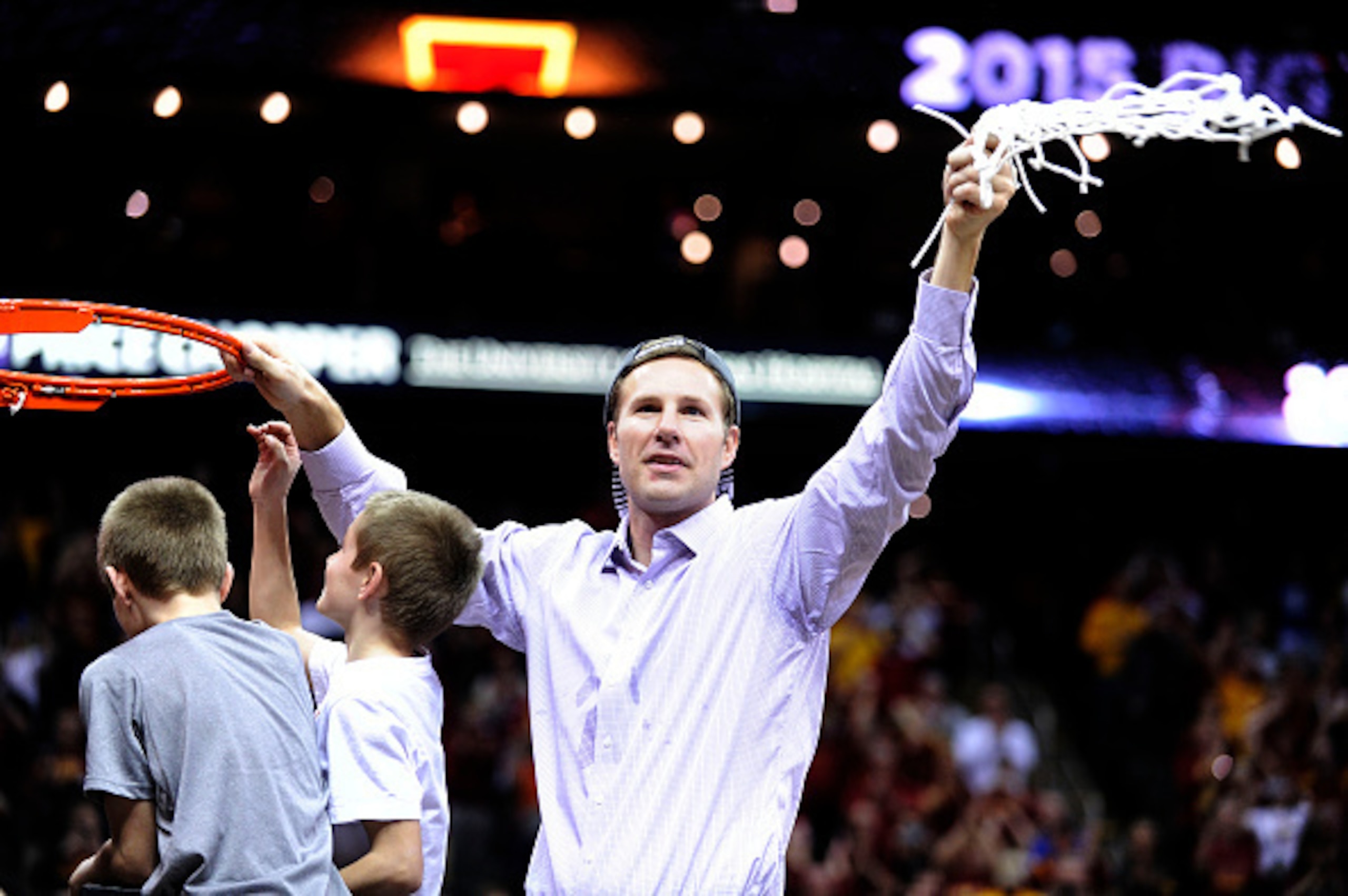 KANSAS CITY, MO - MARCH 14:  Head coach Fred Hoiberg of the Iowa State Cyclones cuts down a piece of the net after their 70 to 66 victory over the Kansas Jayhawks during the championship game of the Big 12 Basketball Tournament at Sprint Center on March 1