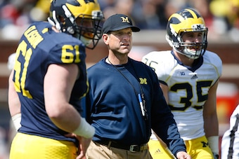 ANN ARBOR, MI - APRIL 04: Head coach Jim Harbaugh of the Michigan Wolverines looks on during the Michigan Football Spring Game on April 4, 2015 at Michigan Stadium in Ann Arbor, Michigan.  (Photo by Gregory Shamus/Getty Images)