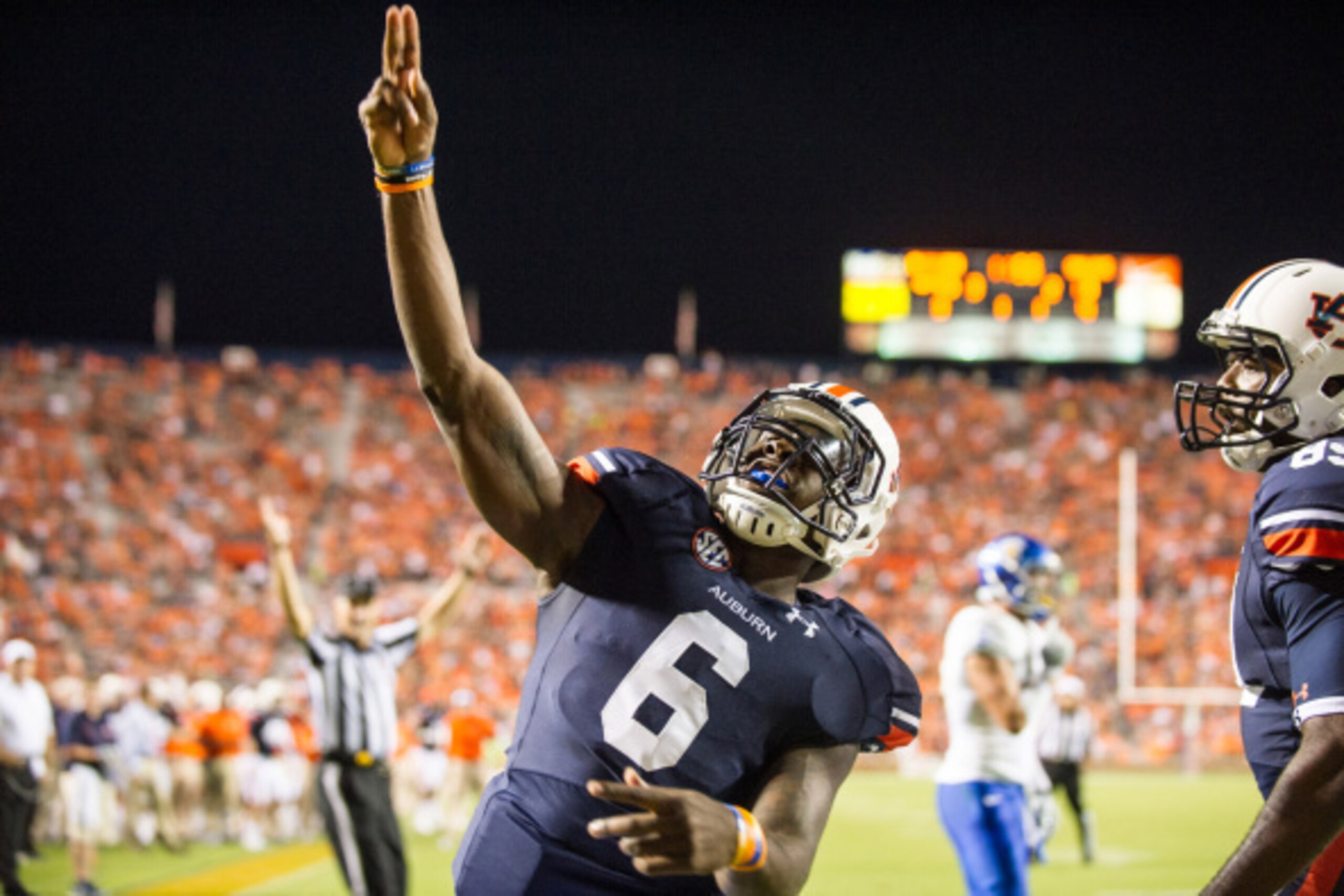 AUBURN, AL - SEPTEMBER 6: Quarterback Jeremy Johnson #6 of the Auburn Tigers points to the crowd after scoring a touchdown during their game against the San Jose State Spartans on September 6, 2014 at Jordan-Hare Stadium in Auburn, Alabama. Auburn defeate