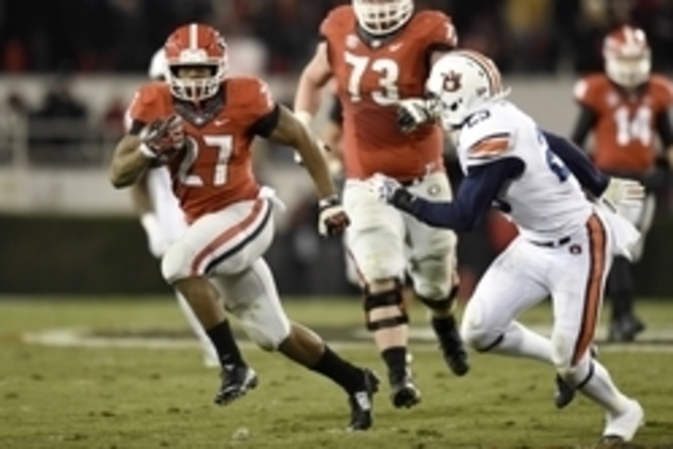 Nov 15, 2014; Athens, GA, USA; Georgia Bulldogs running back Nick Chubb (27) runs against Auburn Tigers defensive back Johnathan Ford (23) during the second half at Sanford Stadium. Georgia defeated Auburn 34-7. Mandatory Credit: Dale Zanine-USA TODAY Spo
