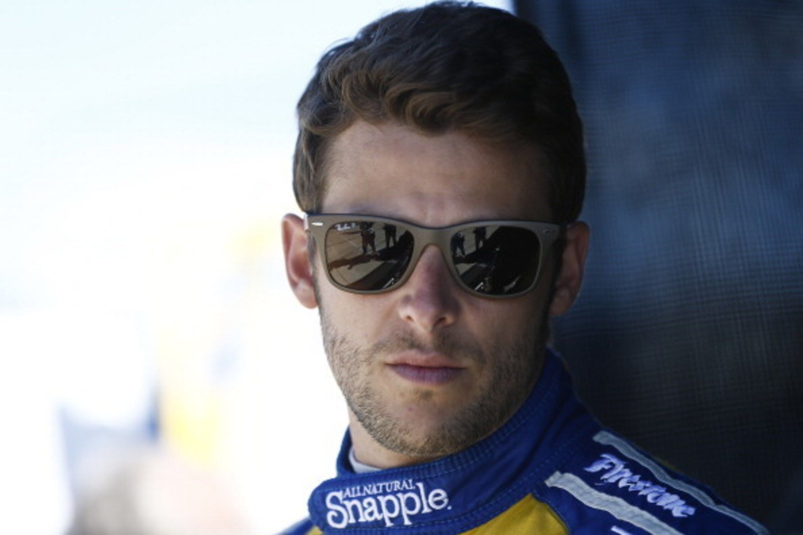 LONG POND, PA - JULY 5 :  Marco Andretti driver of the #25 Snapple Honda stands in the garage area  during practice for the Pocono INDYCAR 500 at Pocono Raceway on July 5, 2014 in Long Pond, Pennsylvania.  (Photo by Jeff Zelevansky/Getty Images)