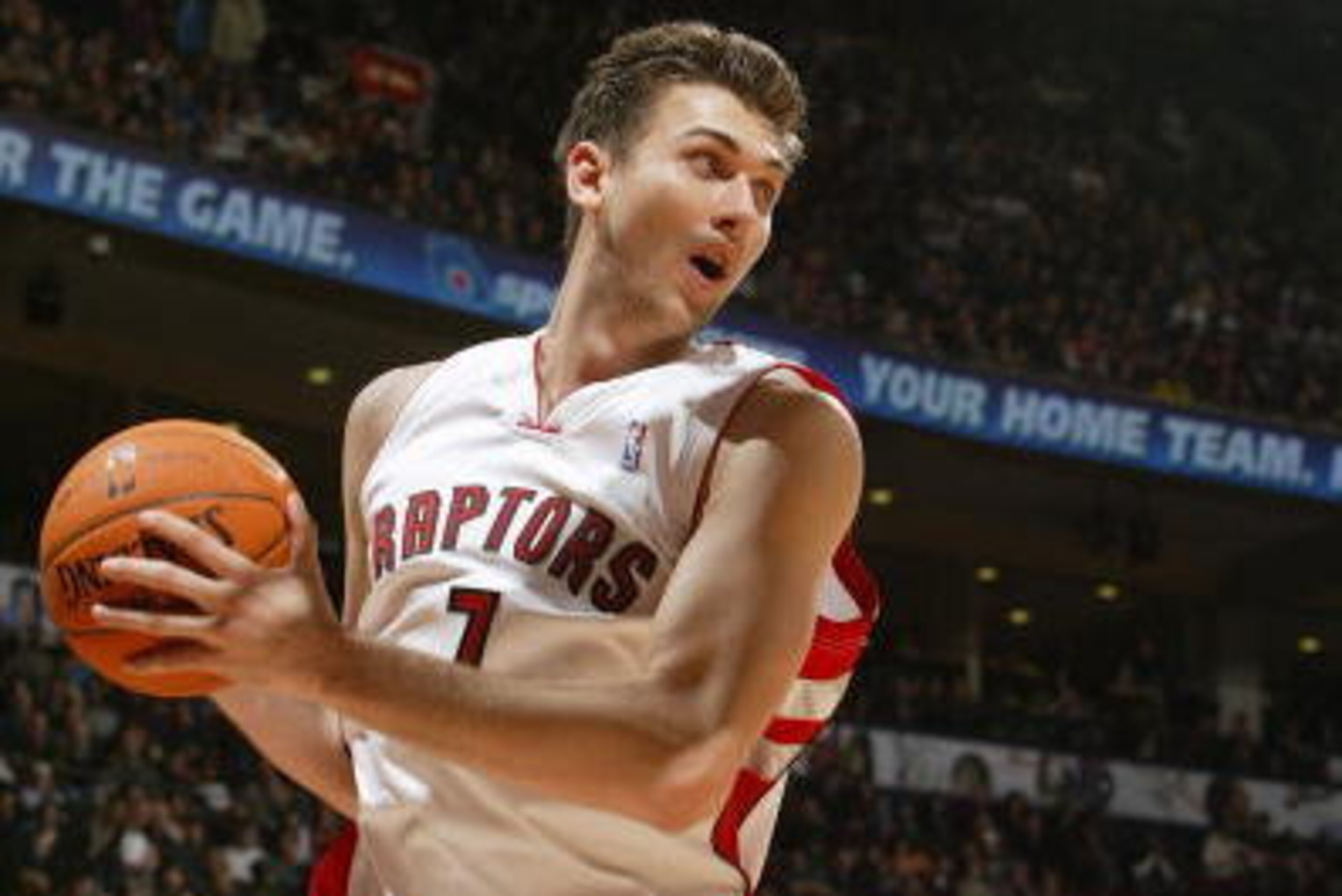 TORONTO - DECEMBER 27:  Andrea Bargnani #7 of the Toronto Raptors rebounds the ball against the Minnesota Timberwolves during their game on December 27, 2006 at the Air Canada Centre in Toronto, Ontario, Canada. The Raptors defeated the Timberwolves 100-9