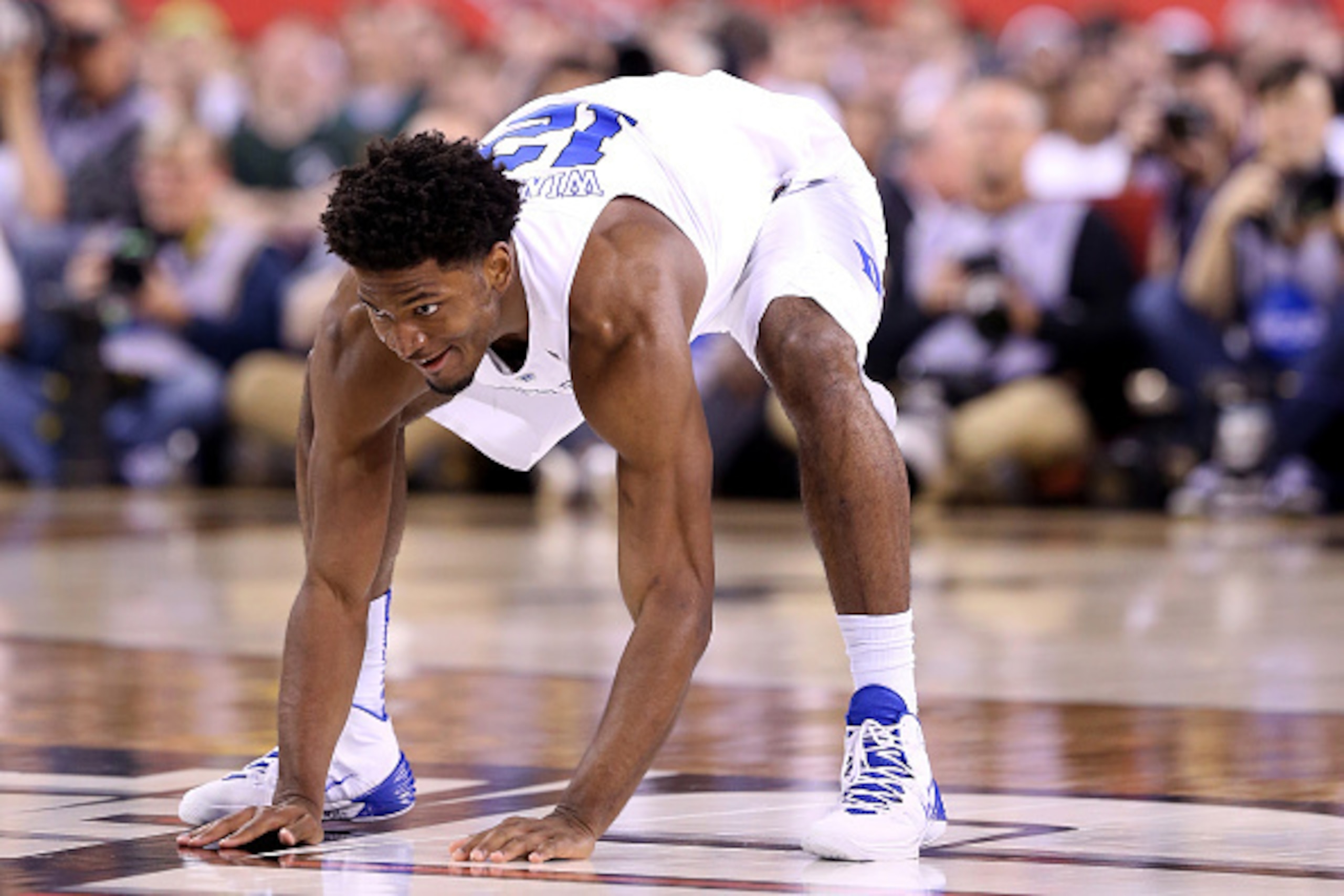 INDIANAPOLIS, IN - APRIL 04: Justise Winslow #12 of the Duke Blue Devils reacts by slapping the floor after a play in the second half against the Michigan State Spartans during the NCAA Men's Final Four Semifinal at Lucas Oil Stadium on April 4, 2015 in INDIANAPOLIS, IN - APRIL 04: Justise Winslow #12 of the Duke Blue Devils reacts by slapping the floor after a play in the second half against the Michigan State Spartans during the NCAA Men's Final Four Semifinal at Lucas Oil Stadium on April 4, 2015 in