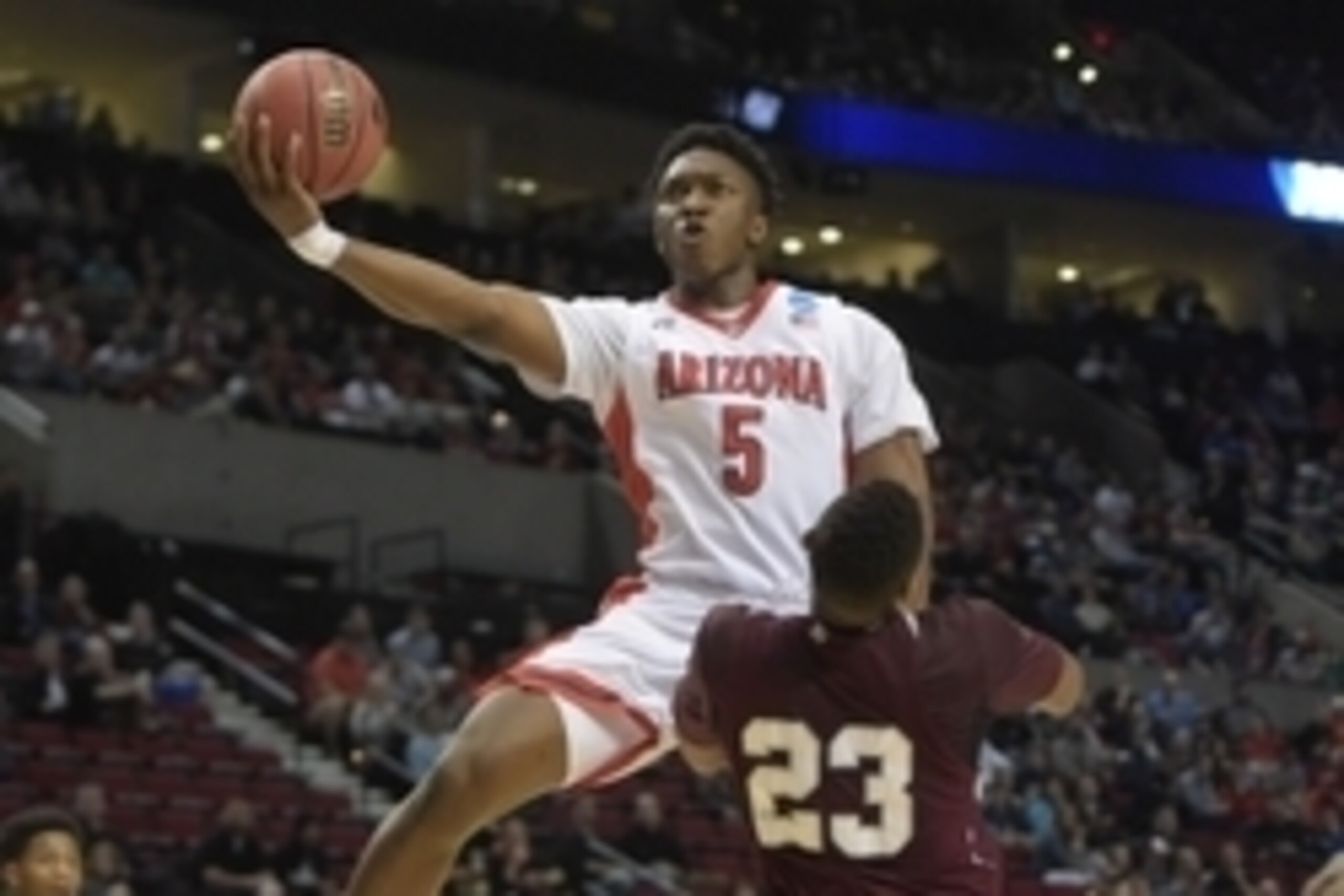 Mar 19, 2015; Portland, OR, USA; Arizona Wildcats forward Stanley Johnson (5) shoots the basketball against Texas Southern Tigers forward Jason Carter (23) during the first half in the second round of the 2015 NCAA Tournament at Moda Center. Mandatory Cre Mar 19, 2015; Portland, OR, USA; Arizona Wildcats forward Stanley Johnson (5) shoots the basketball against Texas Southern Tigers forward Jason Carter (23) during the first half in the second round of the 2015 NCAA Tournament at Moda Center. Mandatory Cre
