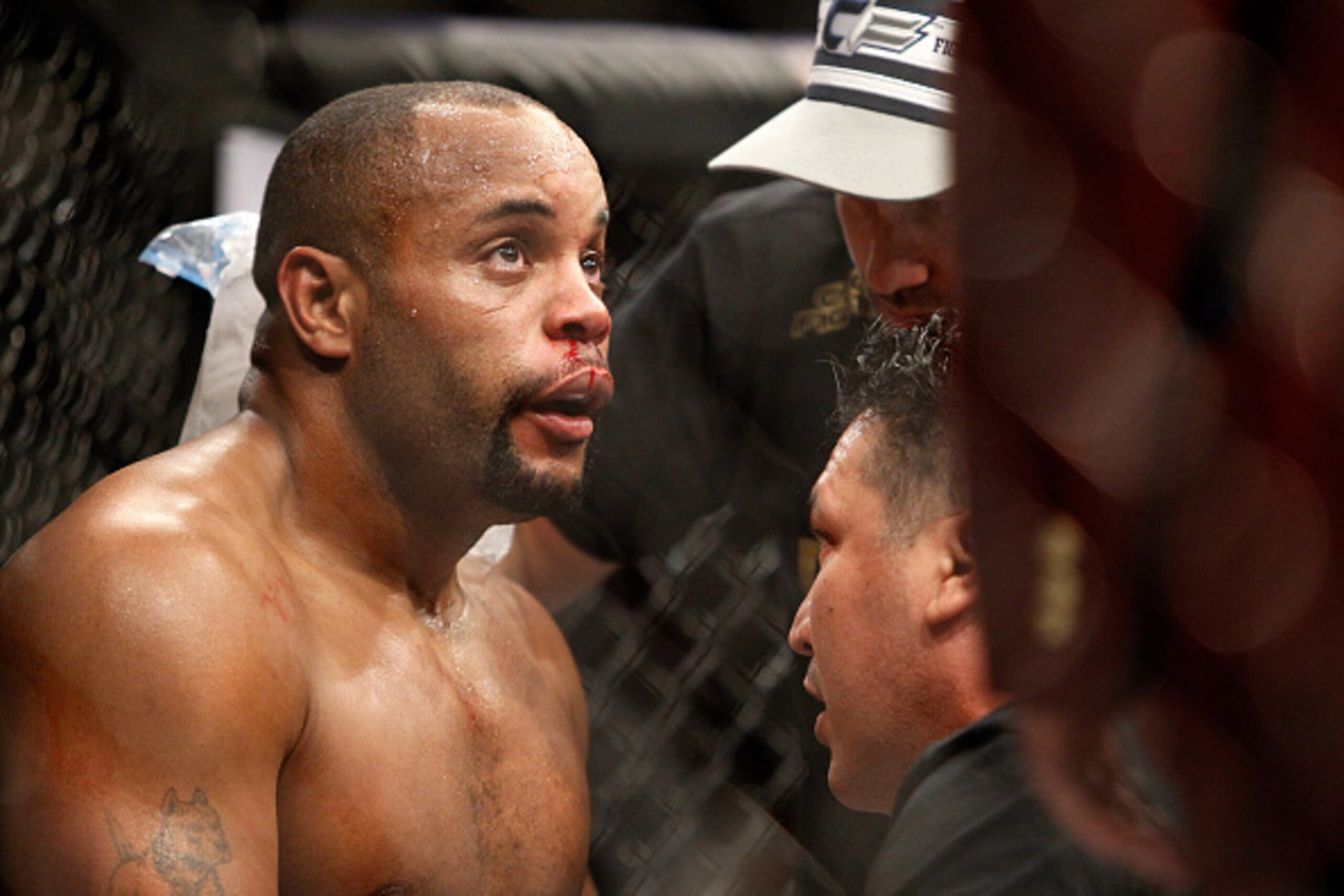 LAS VEGAS, NV - JANUARY 03:  Daniel Cormier is treated between rounds as he takes on light heavyweight champion Jon Jones during the UFC 182 event at the MGM Grand Garden Arena on January 3, 2015 in Las Vegas, Nevada. Jones retained his title by unanimous