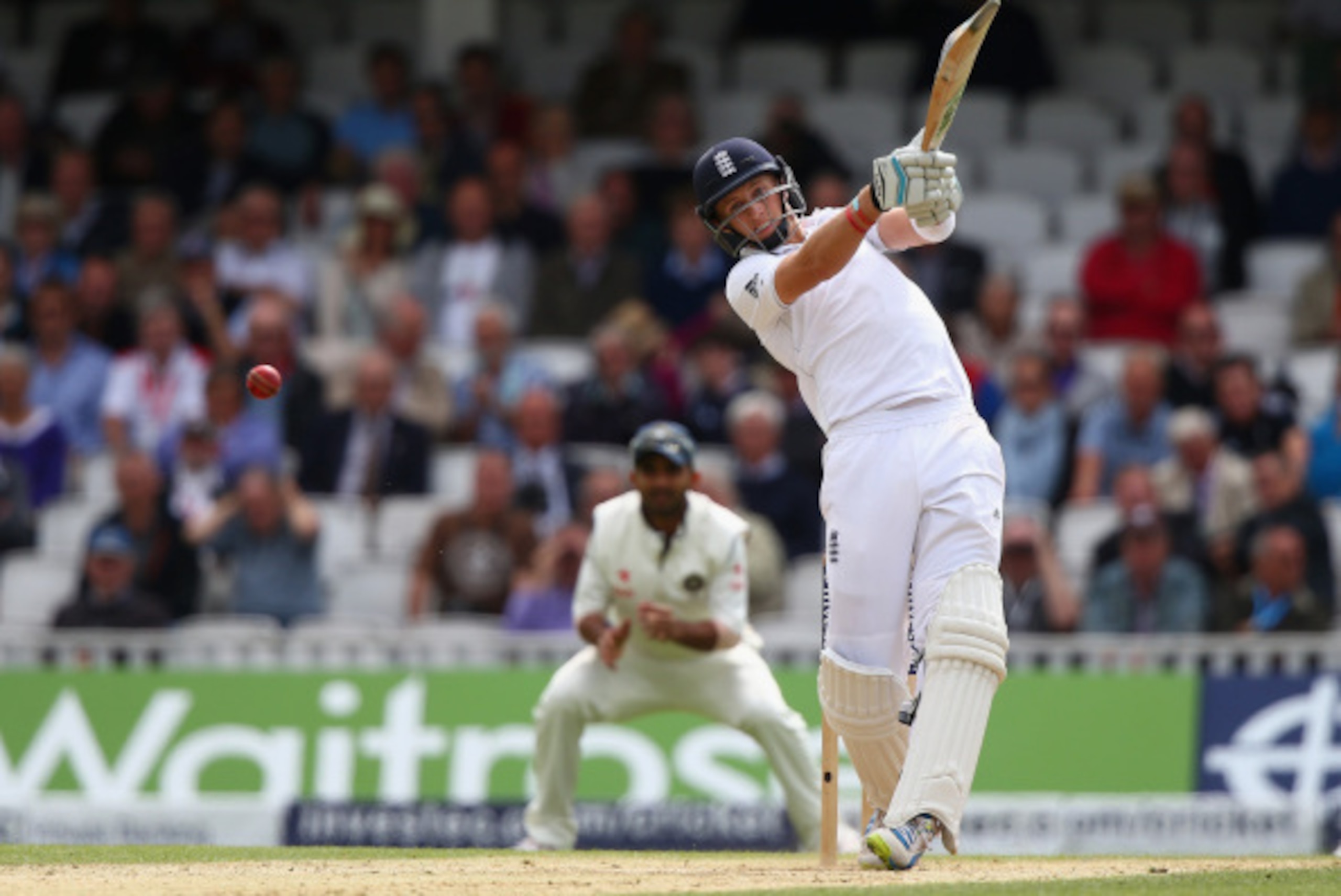 LONDON, ENGLAND - AUGUST 17:  Joe Root of England hits out during day three of the 5th Investec Test match between England and India at The Kia Oval on August 17, 2014 in London, England.  (Photo by Paul Gilham/Getty Images)