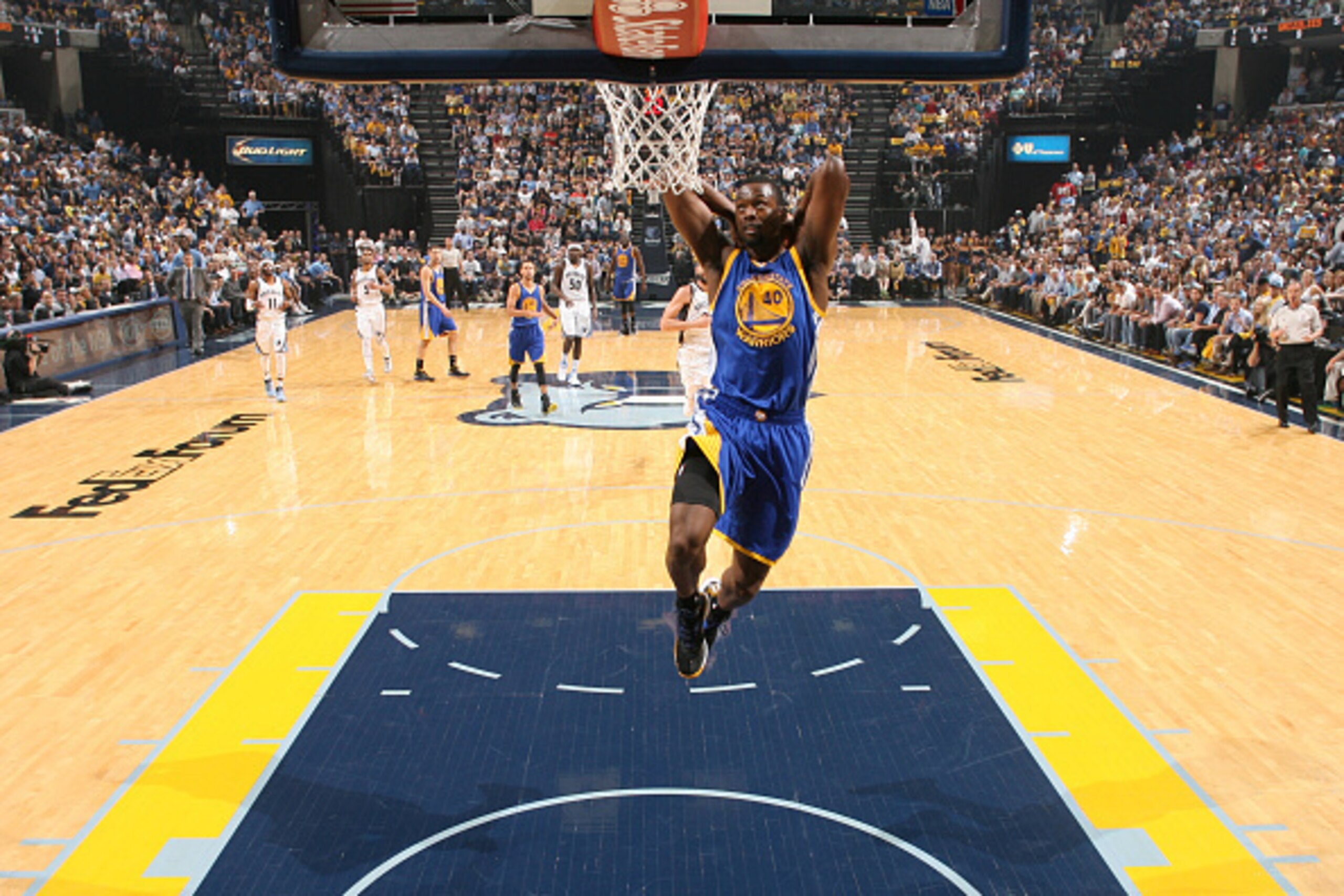 MEMPHIS, TN - MAY 11:  Harrison Barnes #40 of the Golden State Warriors goes up for a dunk against the Memphis Grizzlies in Game Four of the Western Conference Semifinals during the 2015 NBA Playoffs at FedExForum on May 11, 2015 in Memphis, Tennessee. NO