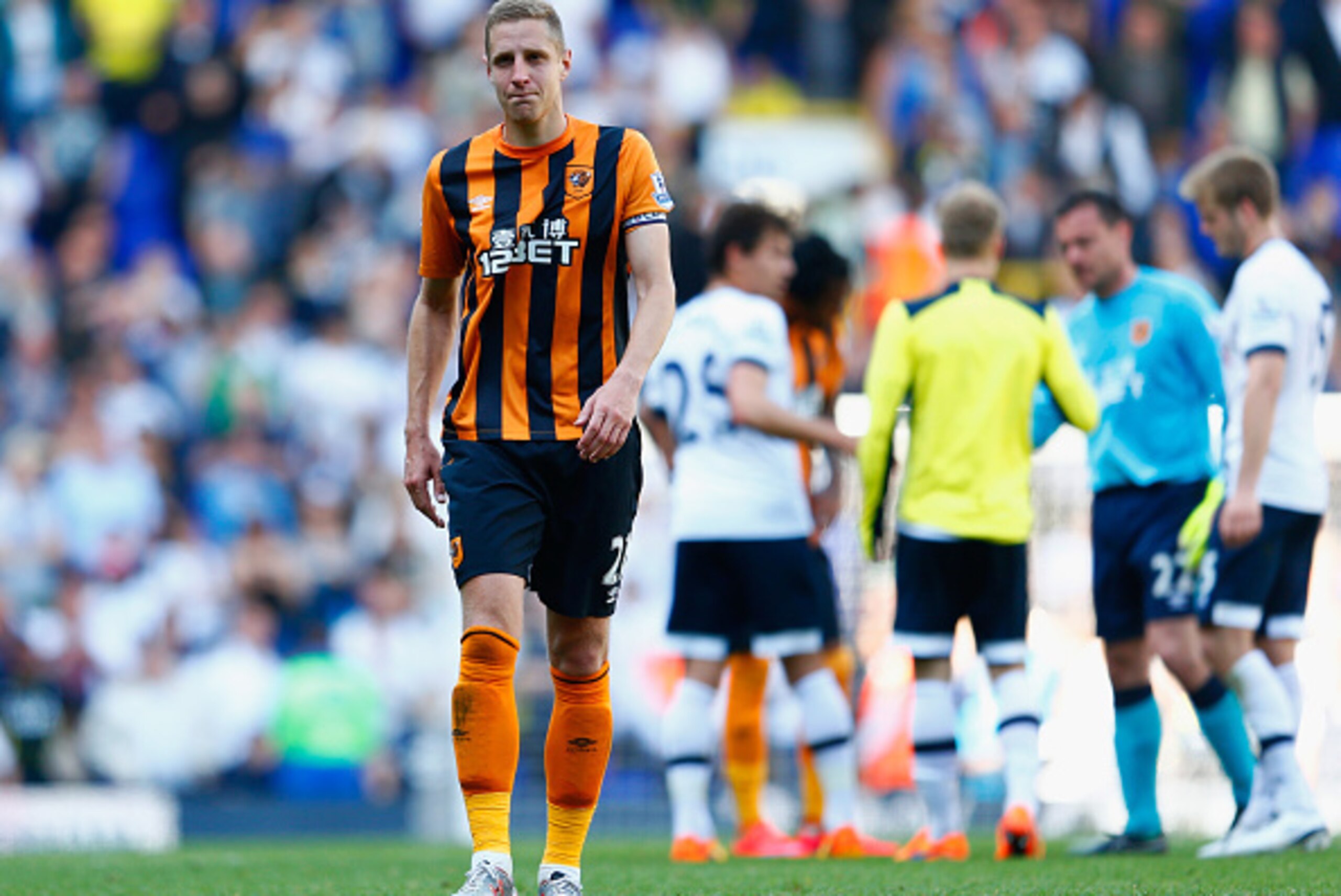 LONDON, ENGLAND - MAY 16:  Michael Dawson of Hull City shows his dejection after his team's defeat in the Barclays Premier League match between  Tottenham Hotspur and Hull City at White Hart Lane on May 16, 2015 in London, England.  (Photo by Julian Finne