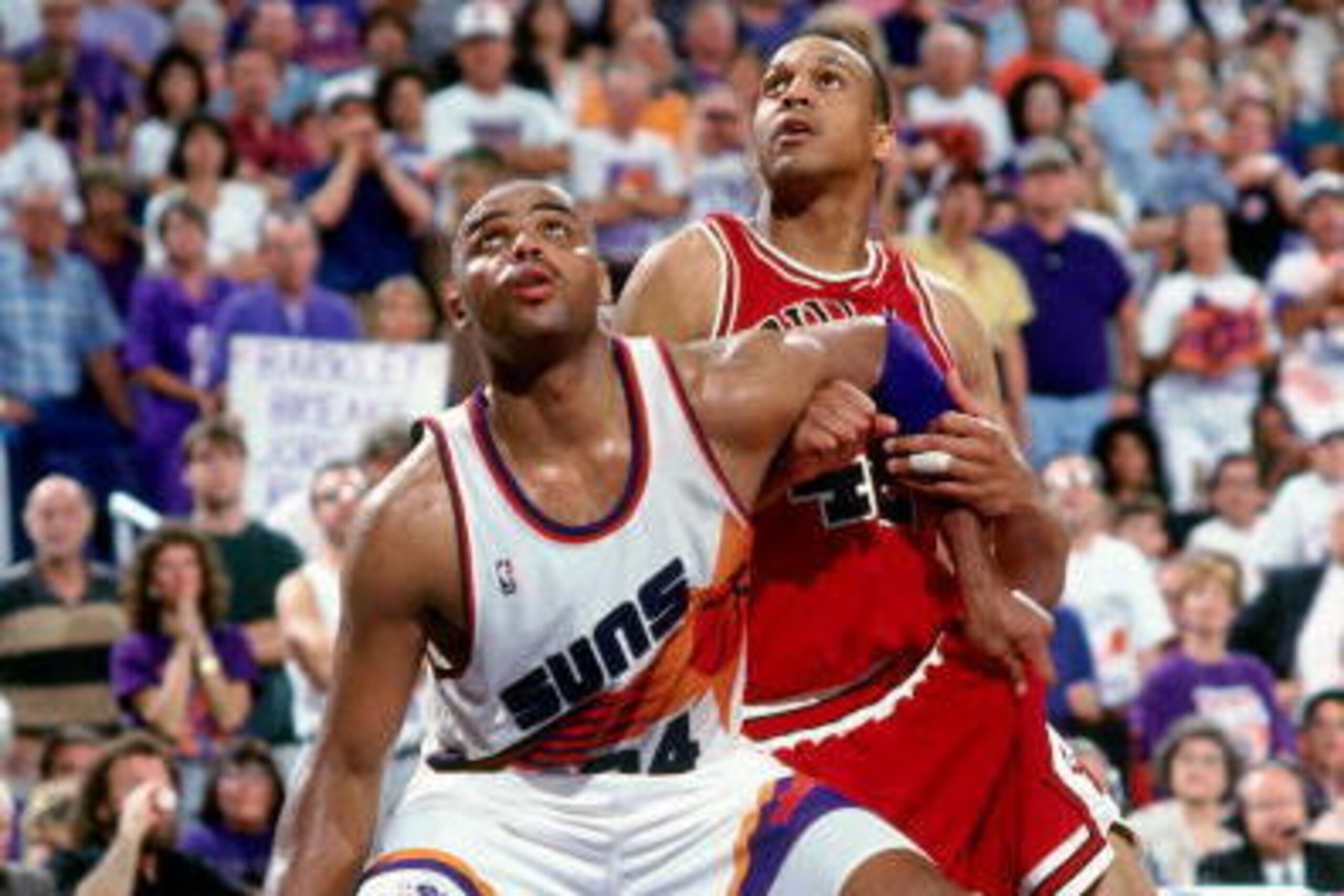 PHOENIX - JUNE 20:  Charles Barkley #34 of the Phoenix Suns battles for position against Sean Williams #42 of the Chicago Bulls in Game Six of the 1993 NBA Finals on June 20, 1993 at th America West Arena in Phoenix, Arizona.  The Bulls won 99-98.  NOTE T