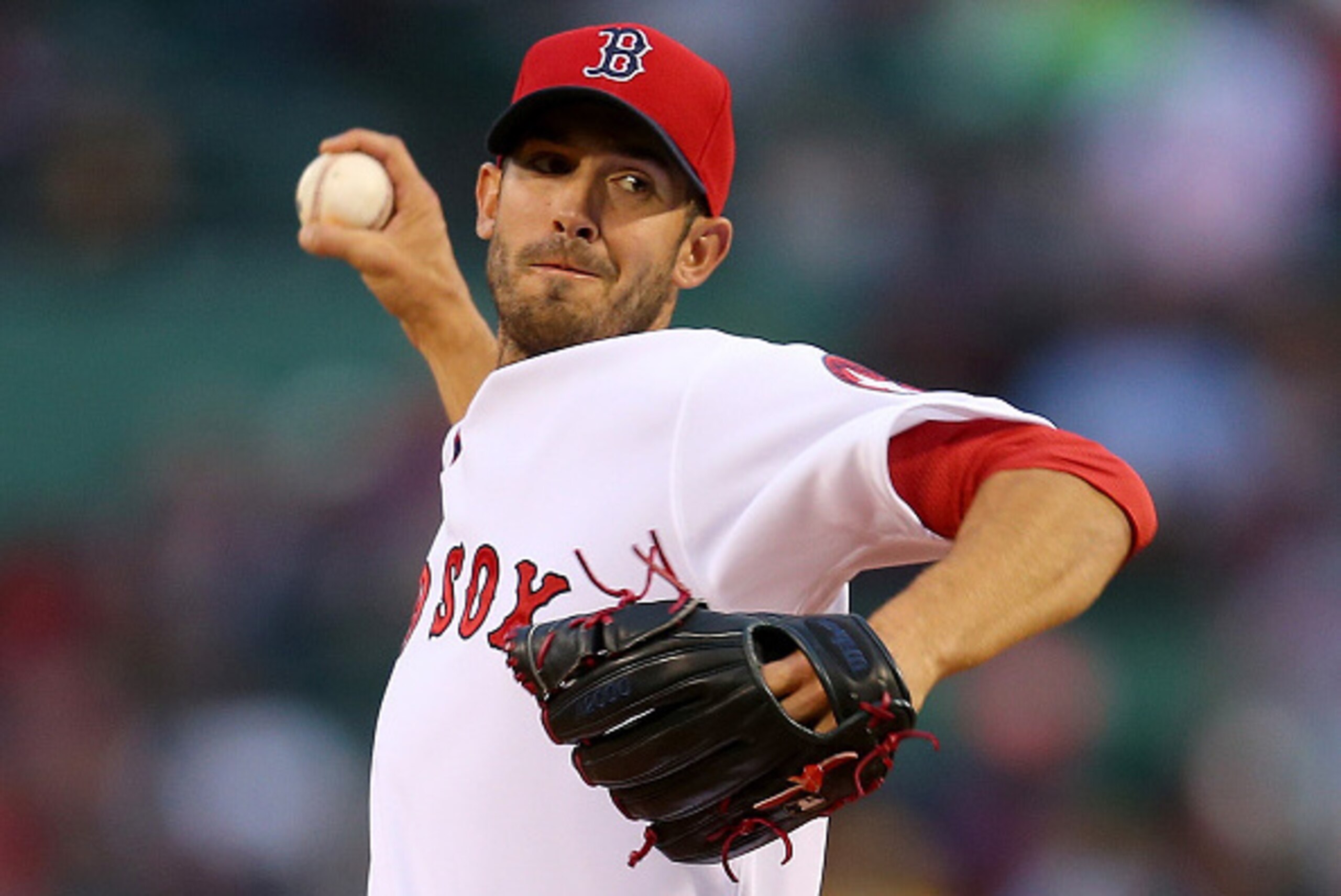 BOSTON, MA - MAY 5: Rick Porcello #22 of the Boston Red Sox throws in the first inning during a game with the Tampa Bay Rays at Fenway Park May 5, 2015 in Boston, Massachusetts.  (Photo by Jim Rogash/Getty Images)