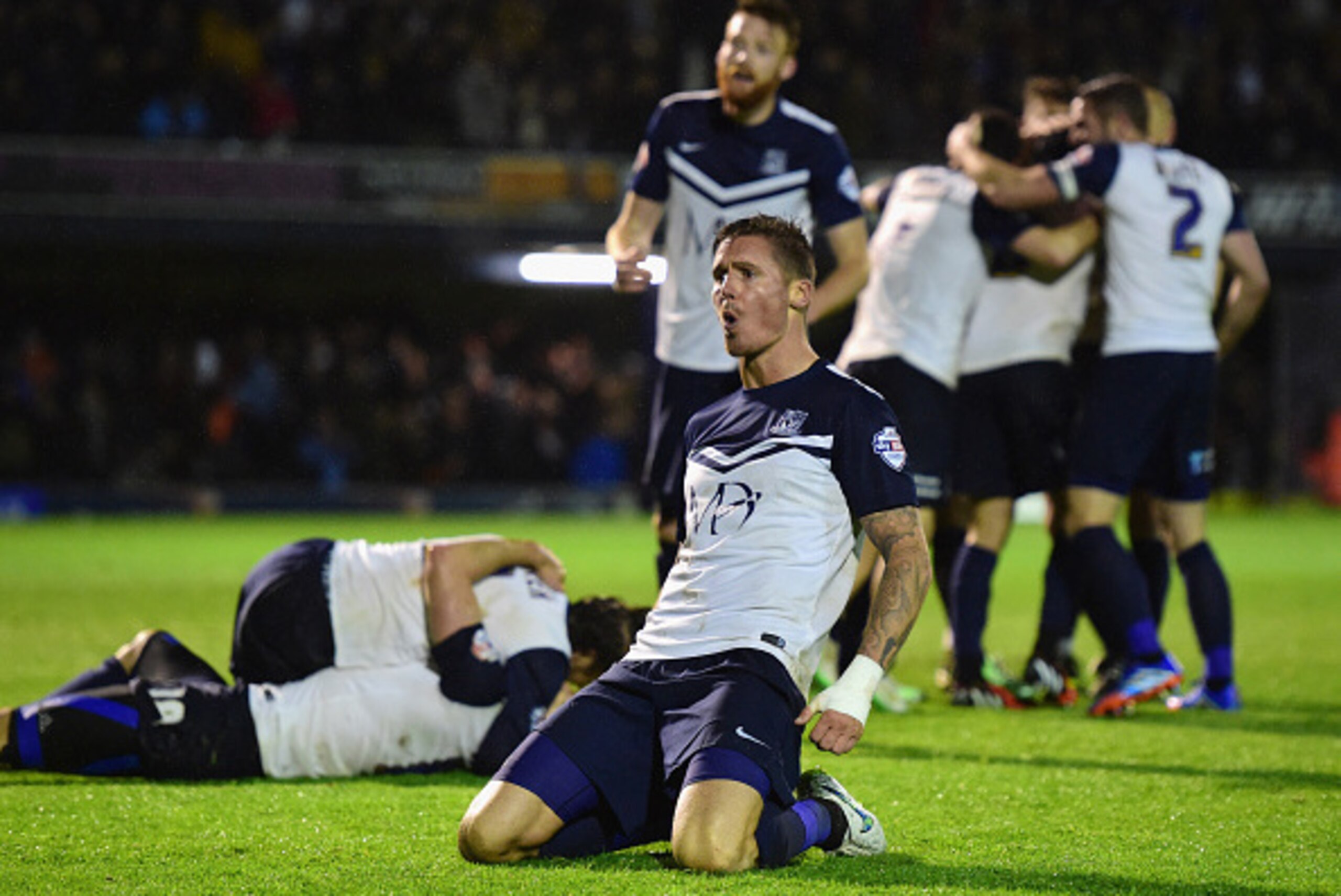 SOUTHEND, ENGLAND - MAY 14:  Barry Corr of Southend United (front) celebrates with team mates as Michael Timlin scores their third goal during the Sky Bet League Two Playoff semi final match between Southend United and Stevenage at Roots Hall on May 14, 2