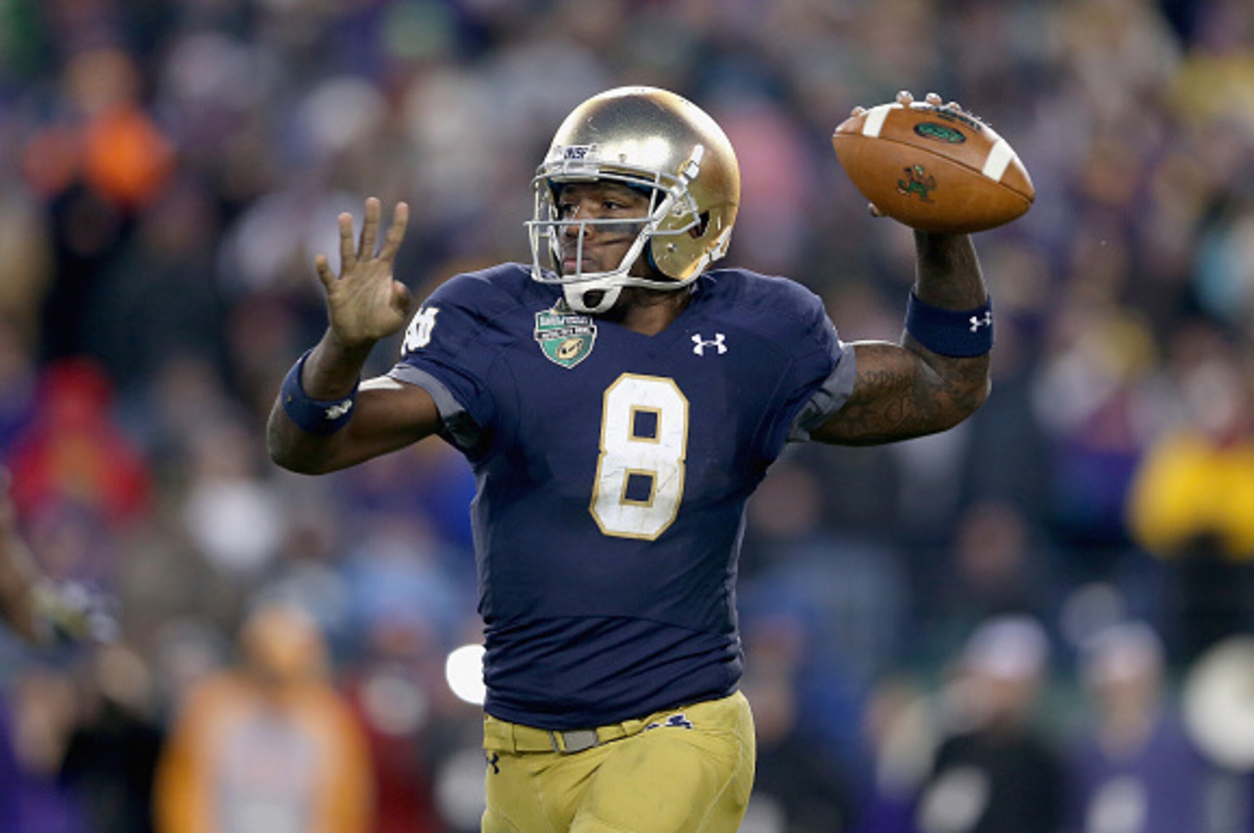 NASHVILLE, TN - DECEMBER 30:  Malik Zaire #8 of the Notre Dame Fighting Irish passes the ball against the LSU Tigers during the Franklin American Mortgage Music City Bowl at LP Field on December 30, 2014 in Nashville, Tennessee.  (Photo by Andy Lyons/Gett